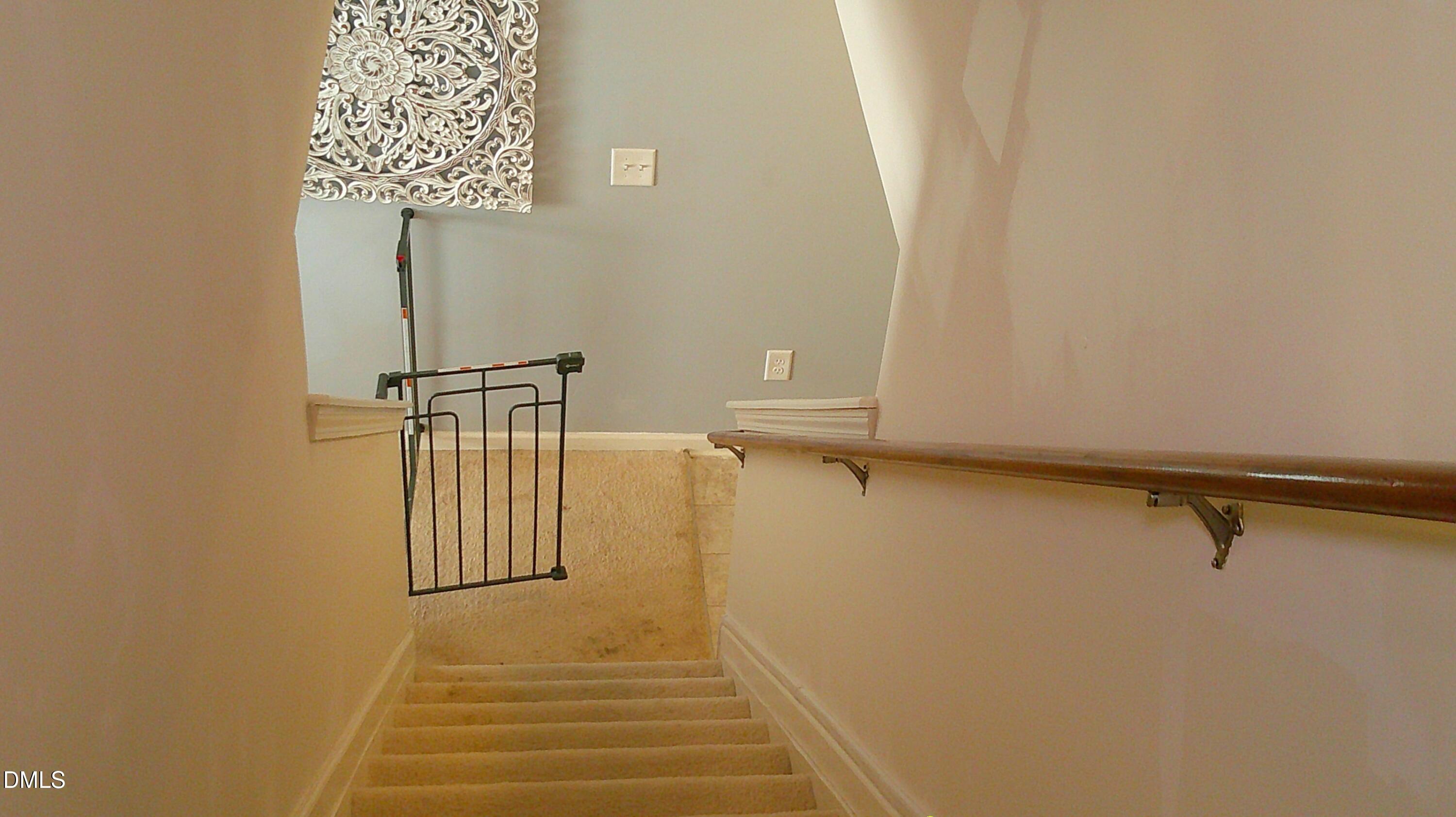 325 Huckleberry Loop Mebane, NC 27302 - Photo 23 of 24 a view of walk in closet with empty racks