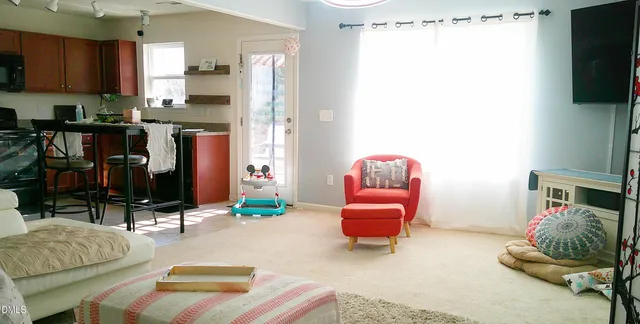 a living room with a couch and a table
