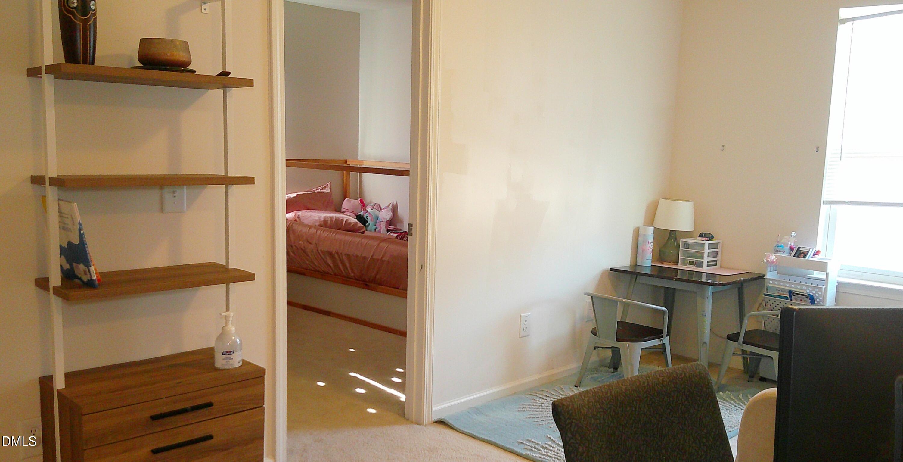 325 Huckleberry Loop Mebane, NC 27302 - Photo 10 of 24 view of living room with furniture and a window