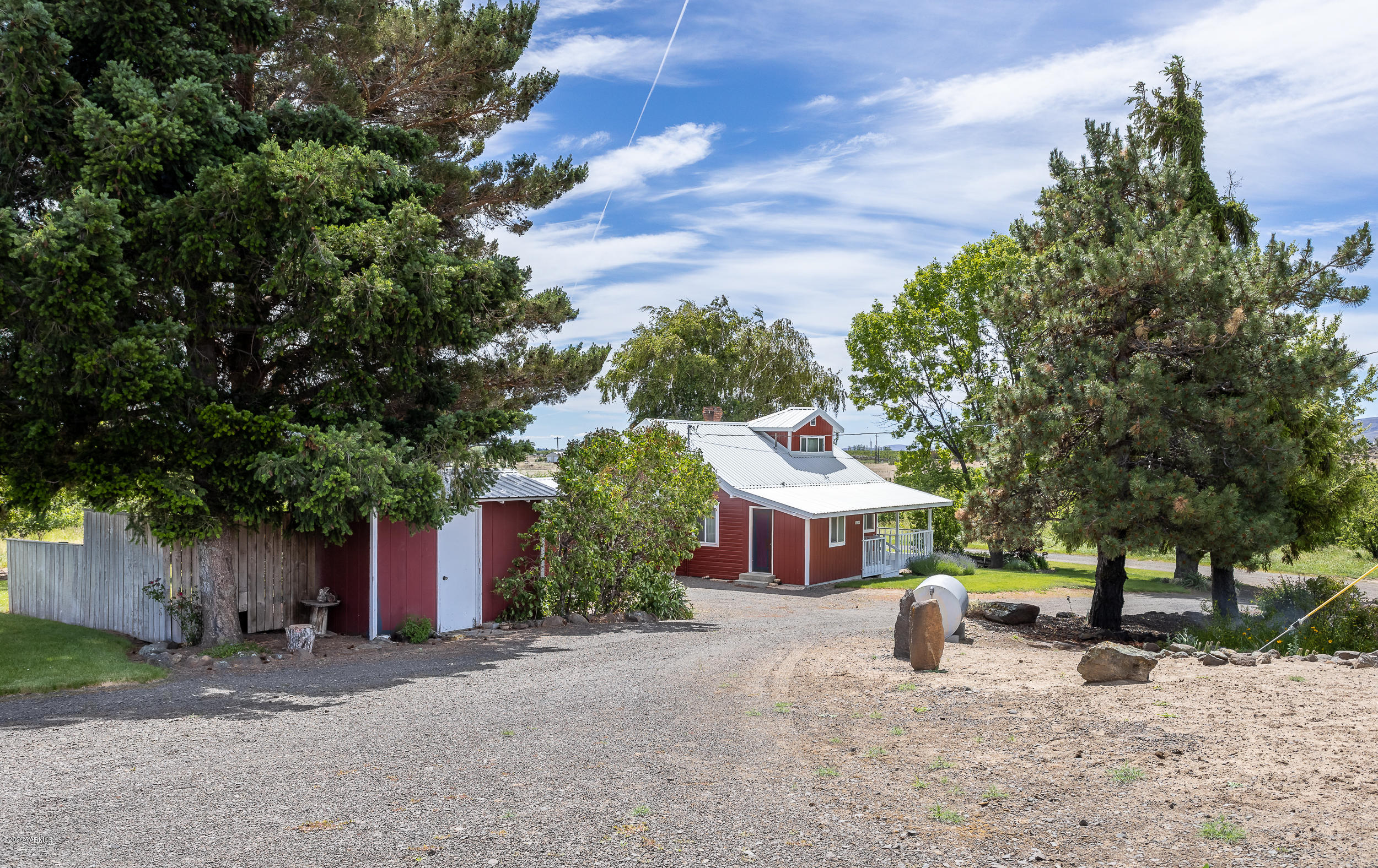 1130 Beffa Road Tieton, WA 98947 - Photo 22 of 23 a front view of a house with a yard and a trees