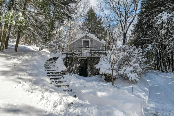 a front view of a house with yard