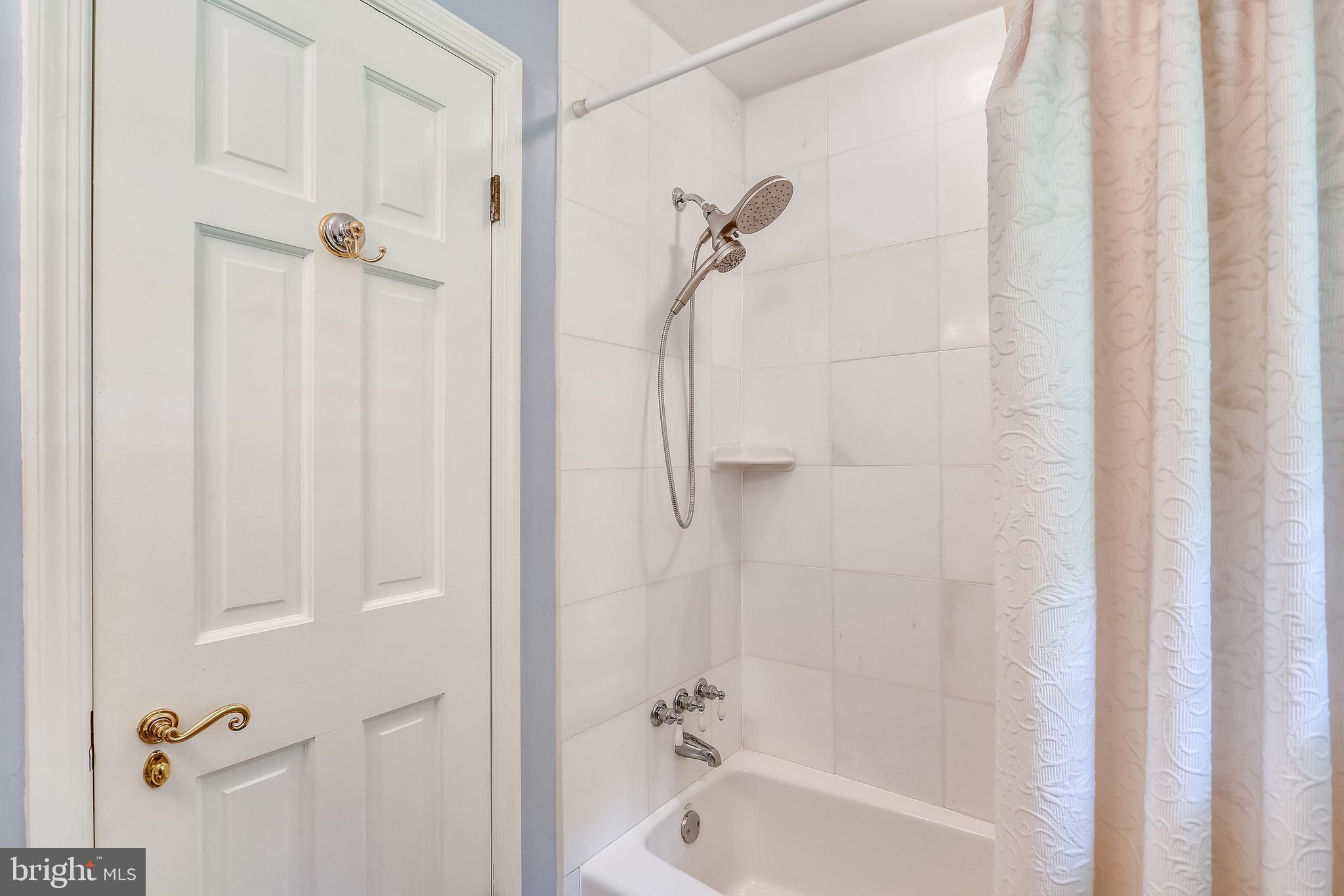 9600 Brink Road Gaithersburg, MD 20882 - Photo 24 of 66 Main level full bath with tub/shower