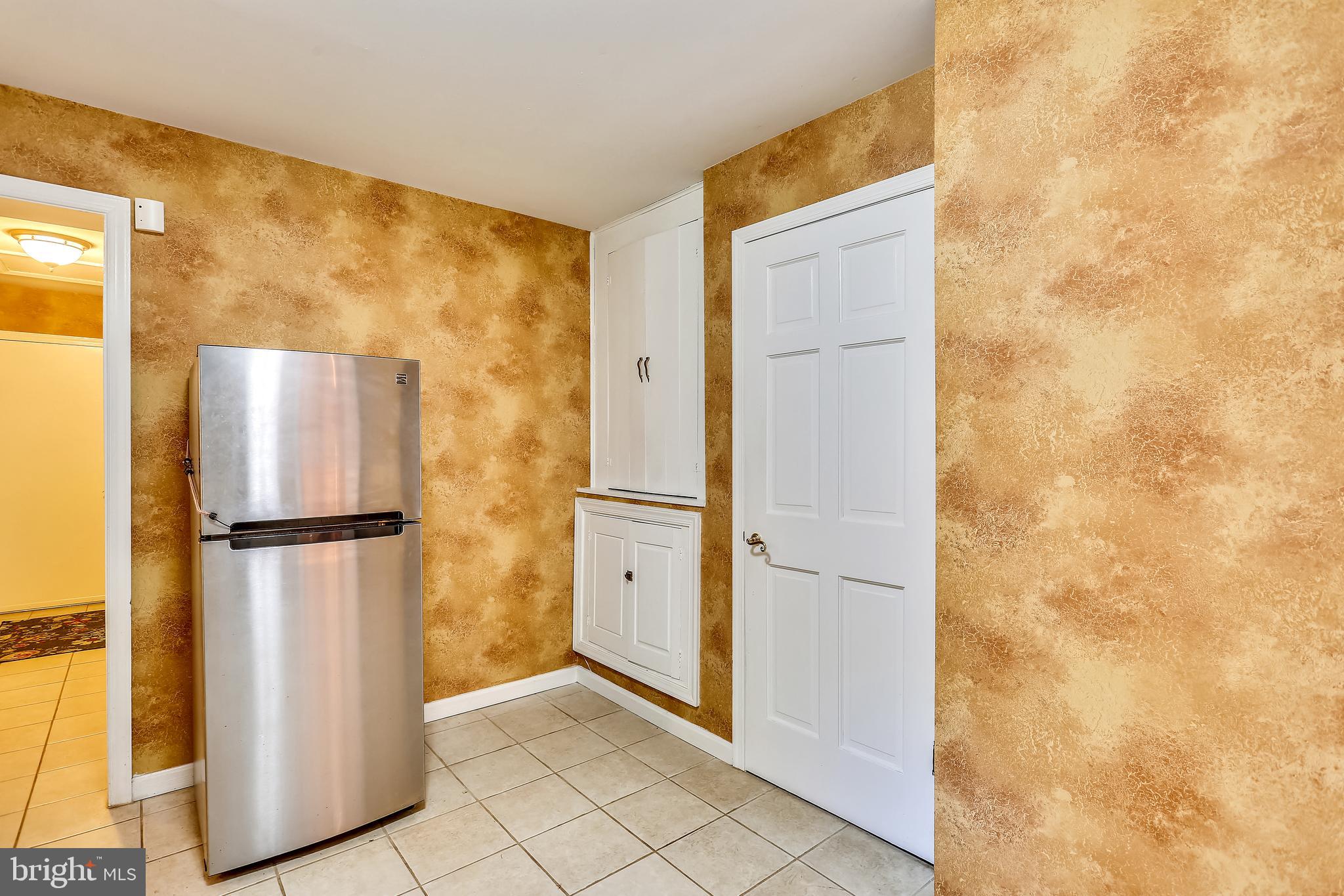 9600 Brink Road Gaithersburg, MD 20882 - Photo 25 of 66 Laundry/mudroom w/extra storage & garage access