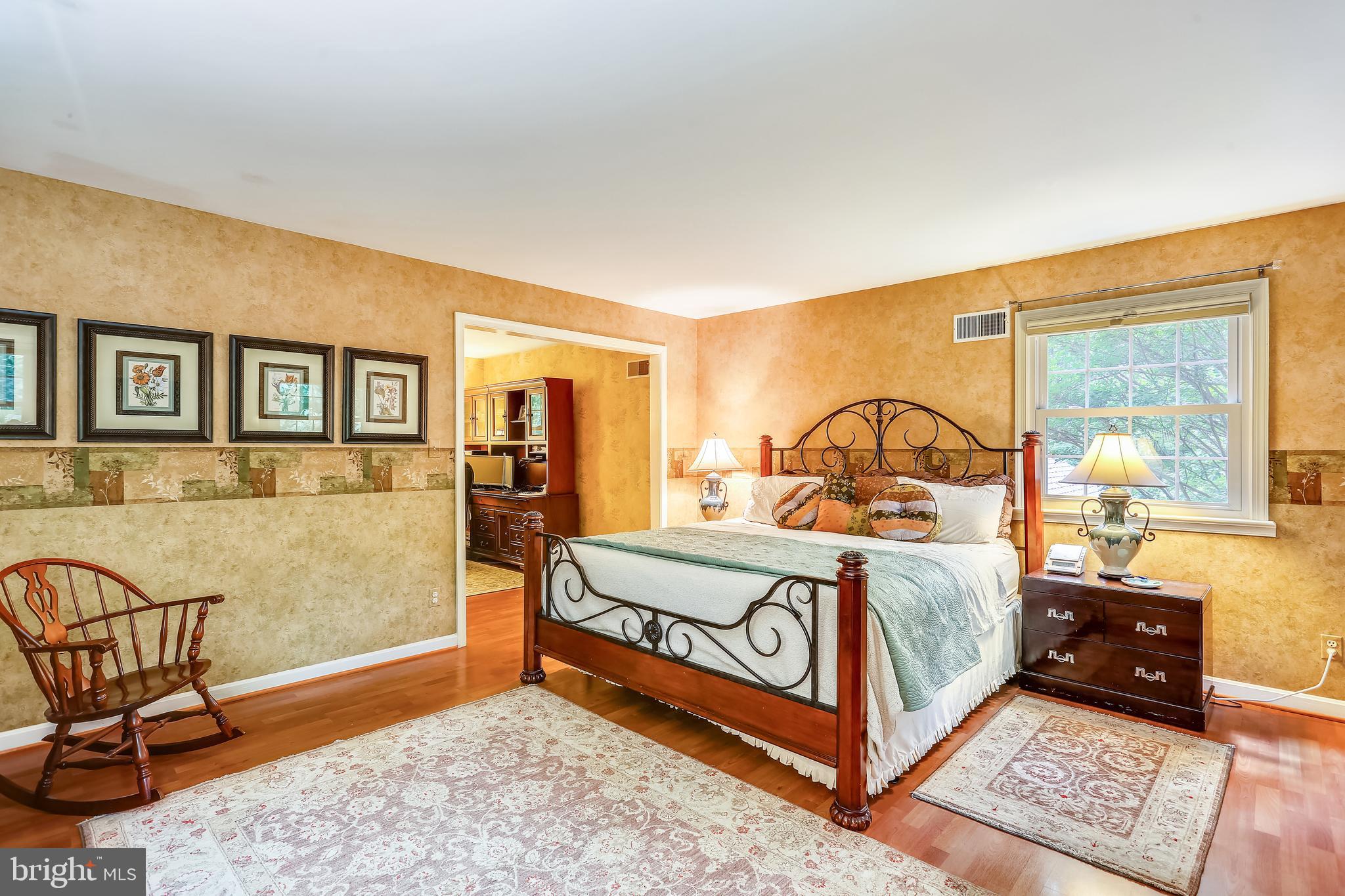 9600 Brink Road Gaithersburg, MD 20882 - Photo 27 of 66 Spacious primary suite w/wood-look flooring