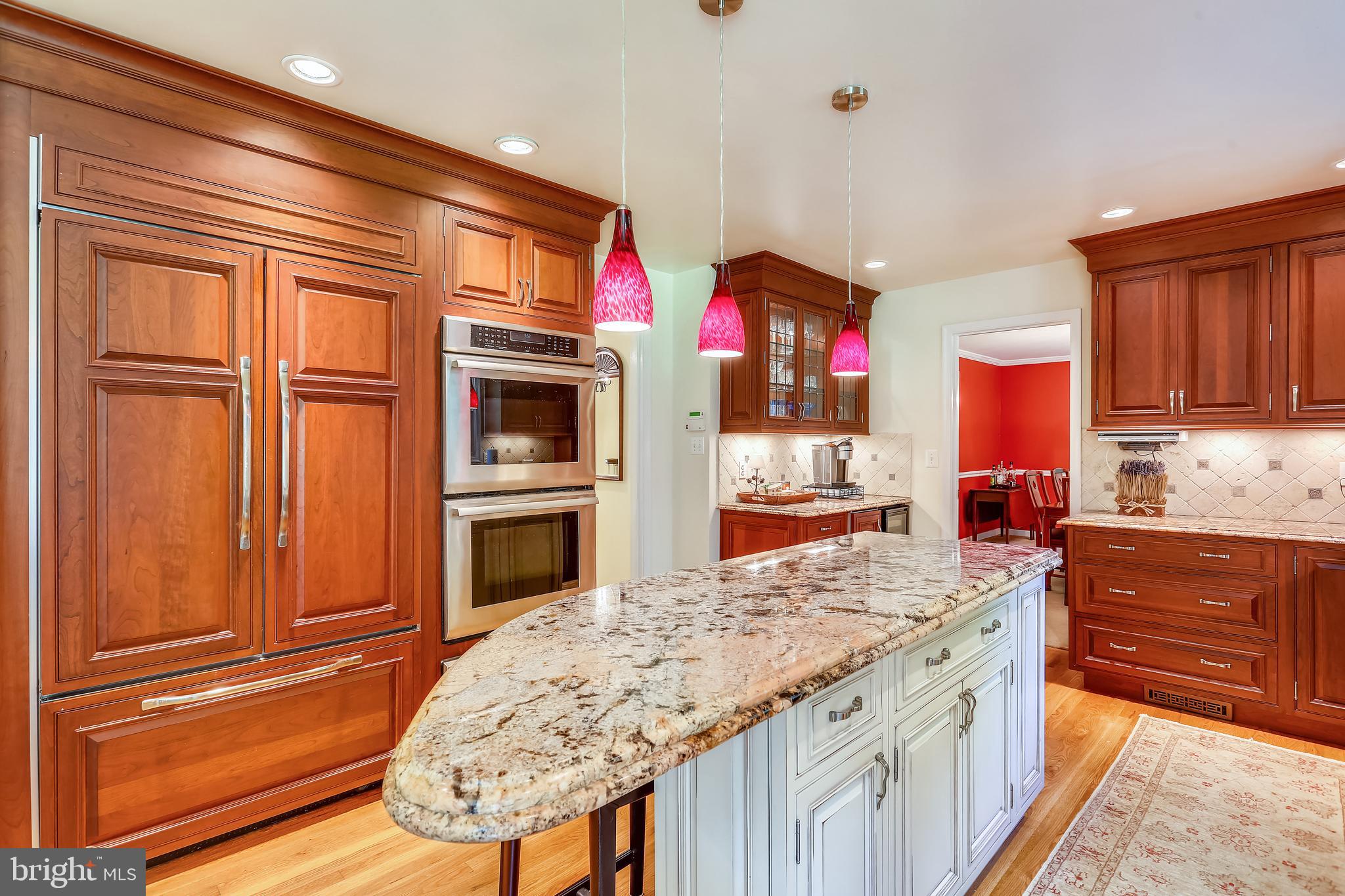 9600 Brink Road Gaithersburg, MD 20882 - Photo 5 of 66 Gracefully curved island & cabinet-front fridge