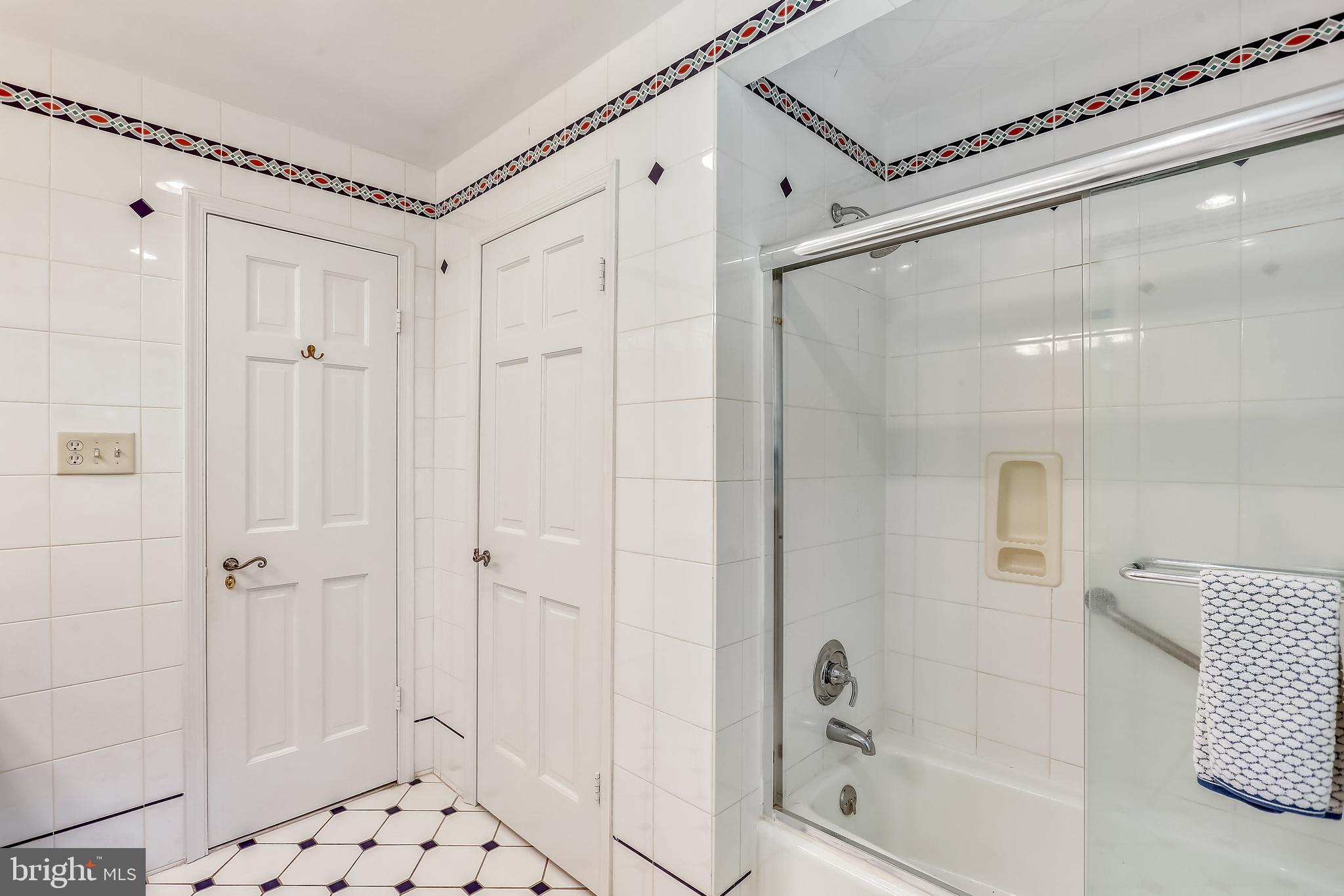 9600 Brink Road Gaithersburg, MD 20882 - Photo 46 of 66 Second full bath w/glass-doored tub/shower