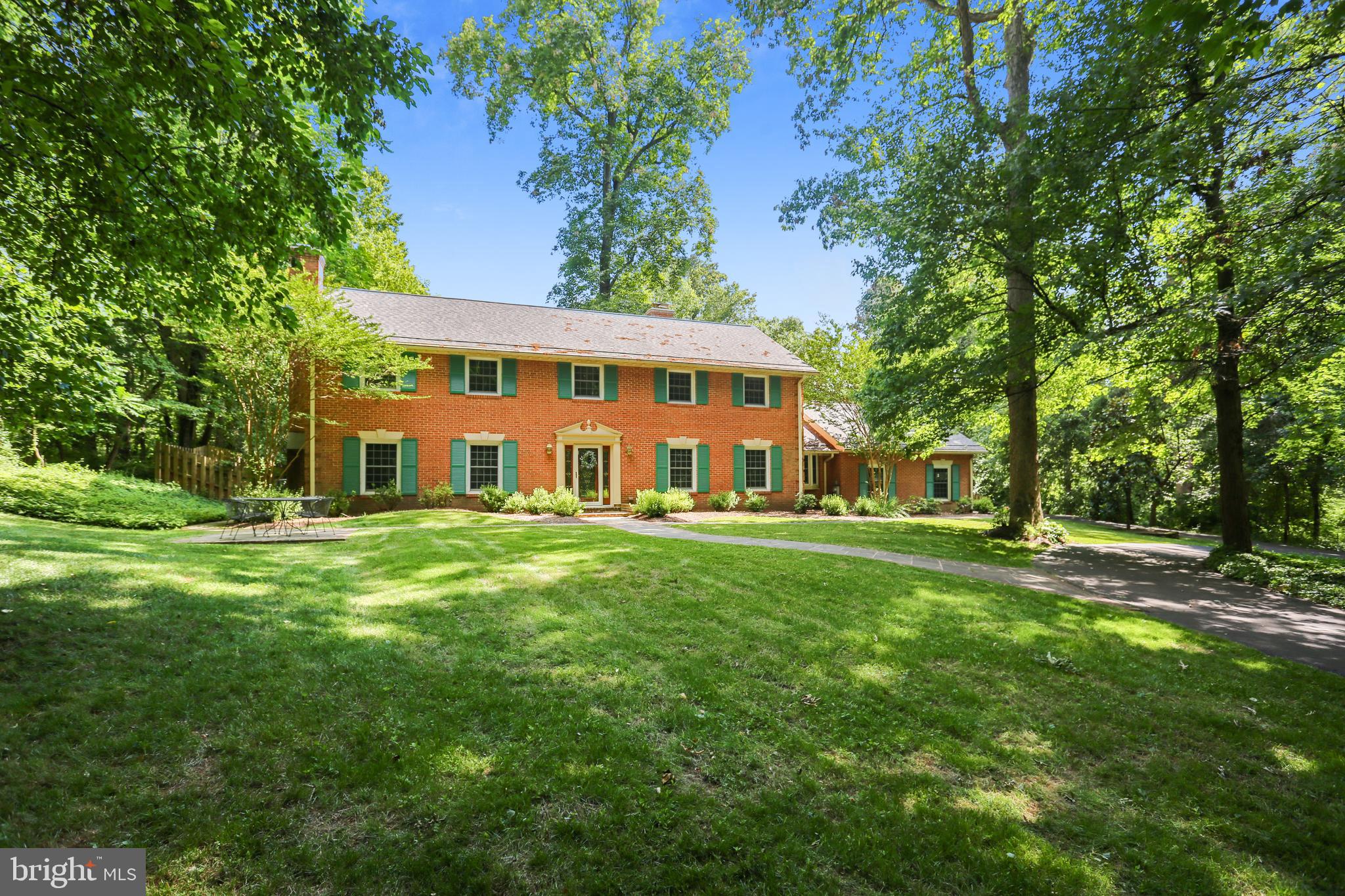 9600 Brink Road Gaithersburg, MD 20882 - Photo 64 of 66 Set on large, lot bordered by trees