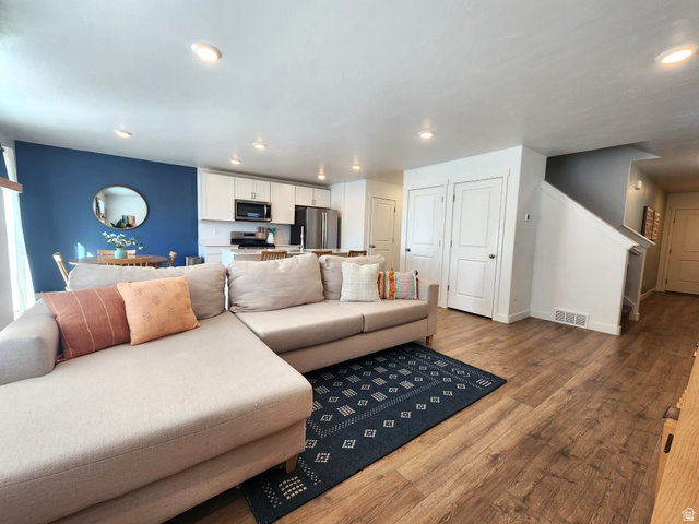 1736 East Fall Street Eagle Mountain, UT 84005 - Photo 5 of 30 Living room featuring hardwood / wood-style floors and recessed lighting