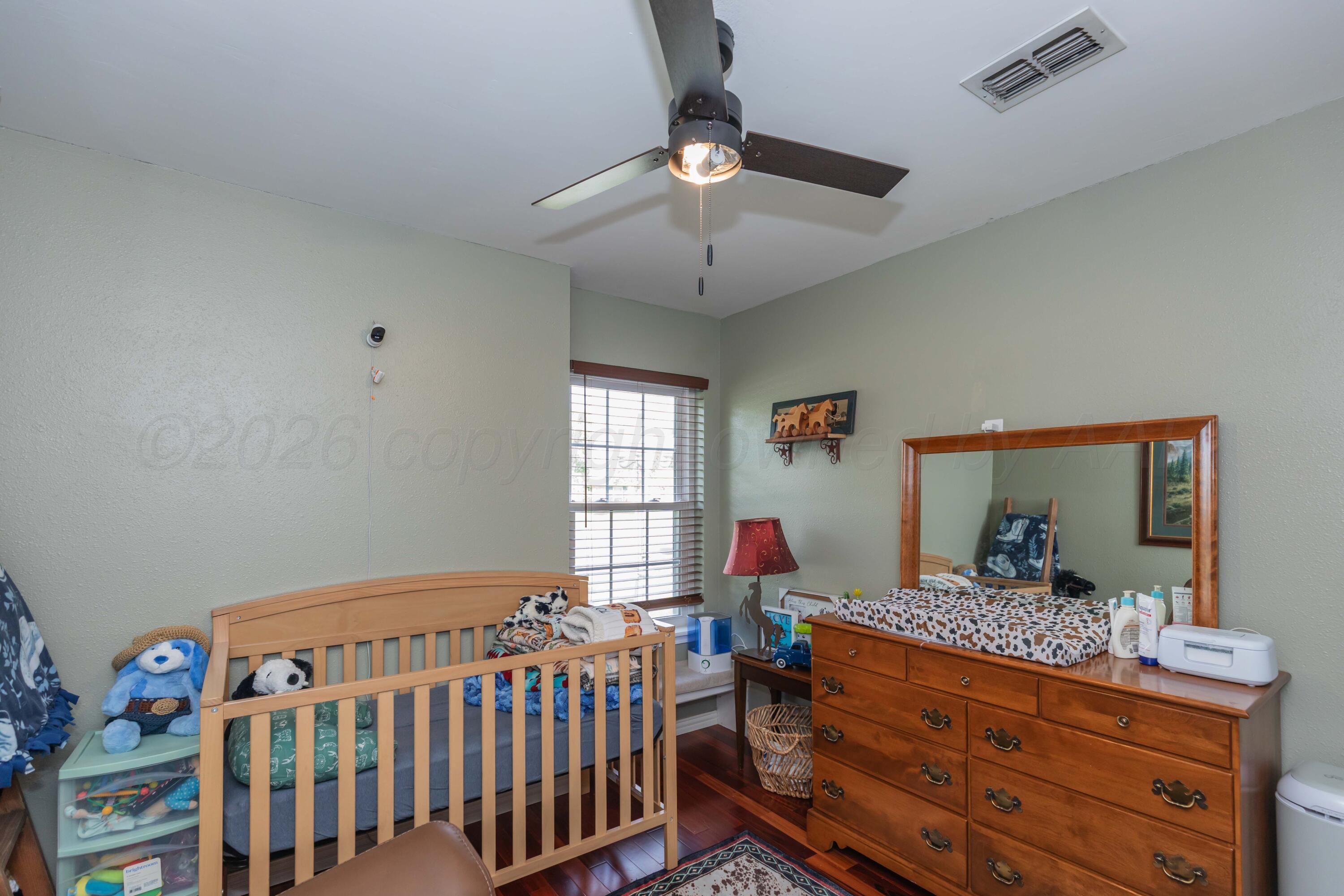 8303 Ranier Drive Amarillo, TX 79110 - Photo 21 of 27 BEDROOM 3 VIEW 2