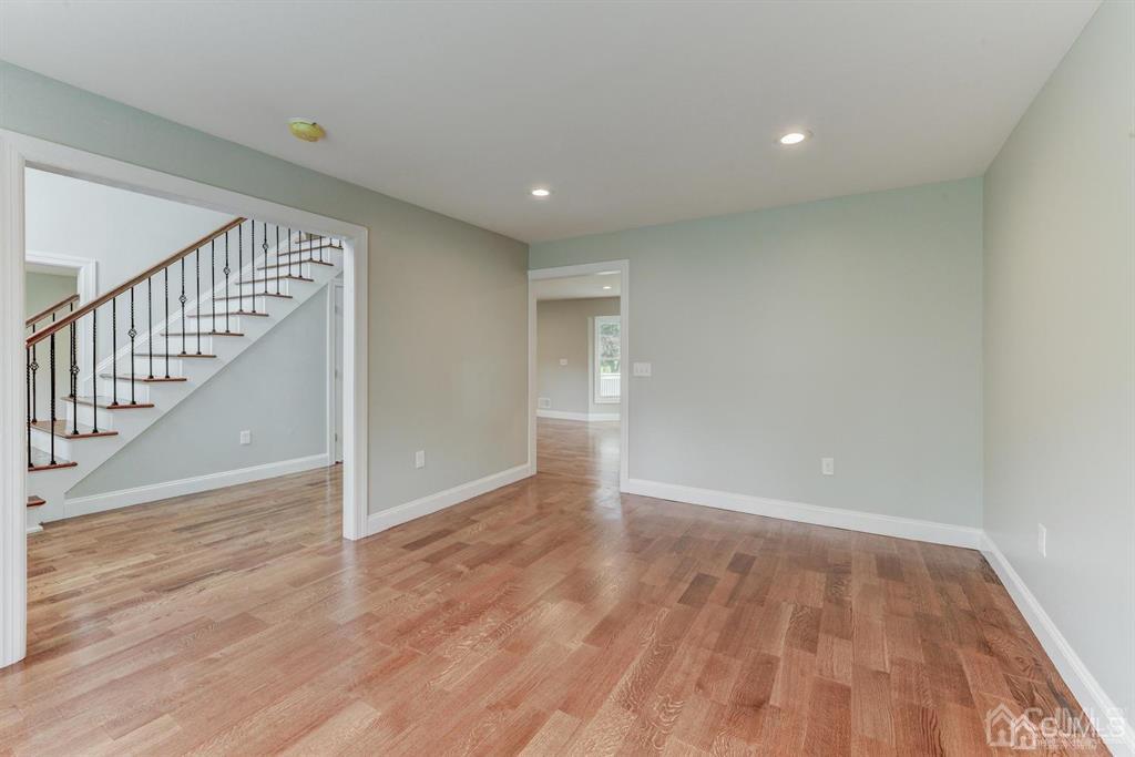 7 Ramsey Road Edison, NJ 08820 - Photo 6 of 28 a view of an empty room with wooden floor