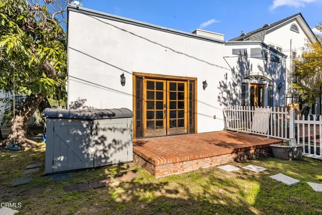 a front view of a house with a garage