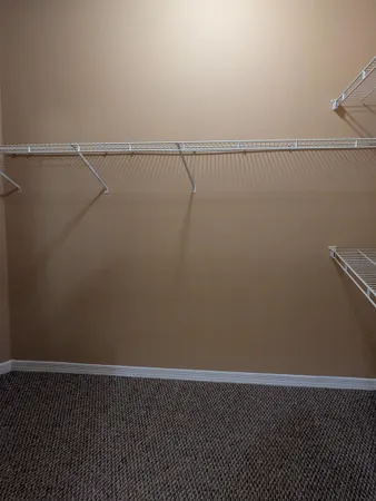 a view of a room with racks on the wall