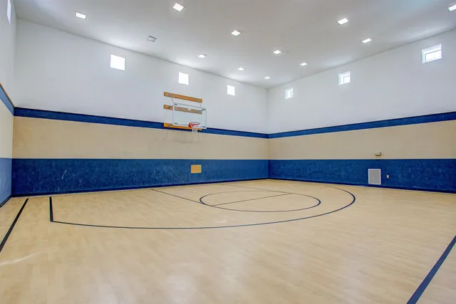 a view of an empty room with a projector