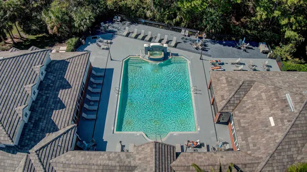 aerial view of a house with outdoor space