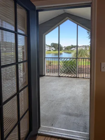 a view of outdoor space with sliding window