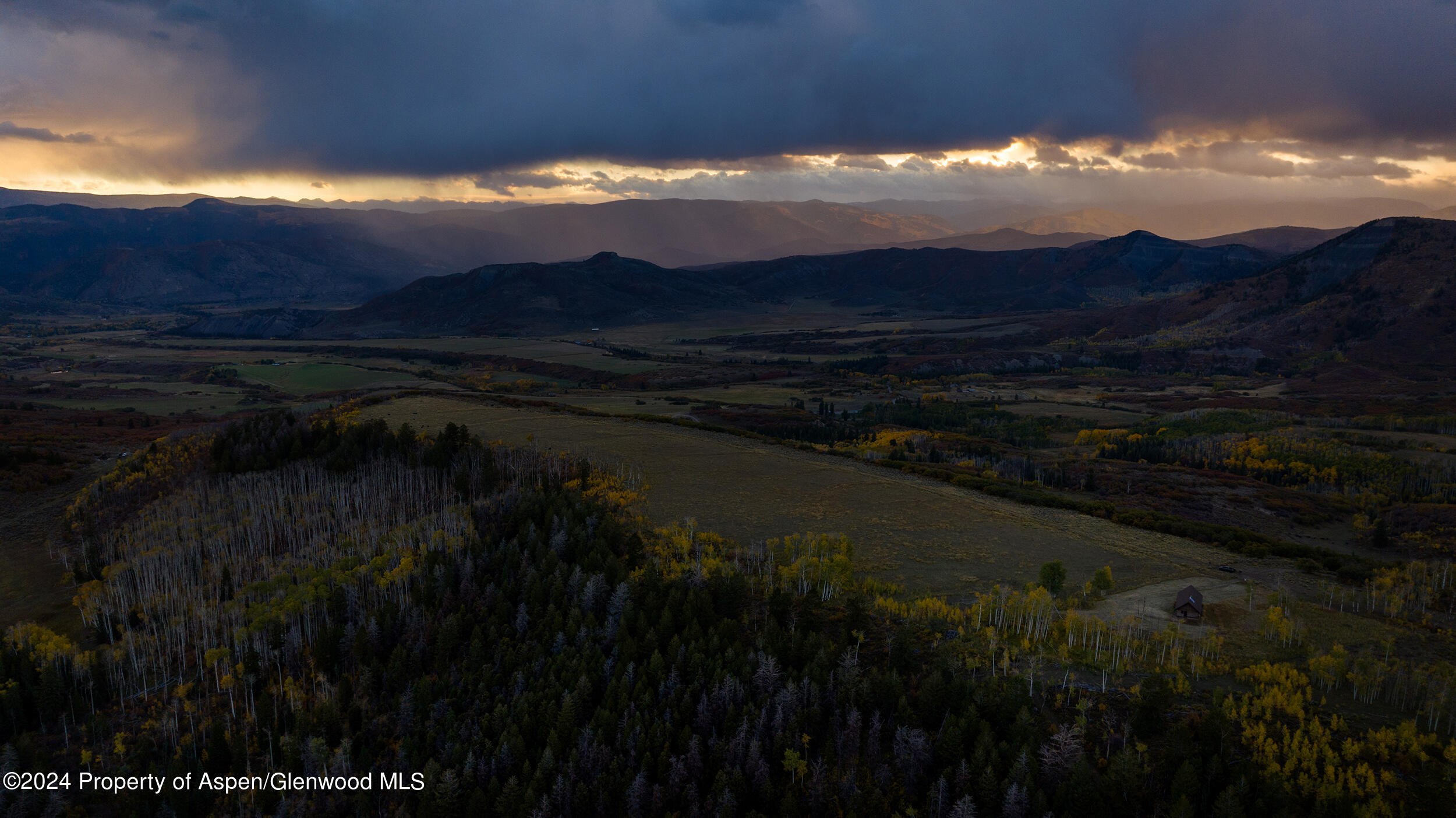 1012 Monastery Road Snowmass, CO 81654 - Photo 12 of 96 a view of a lake in middle of forest