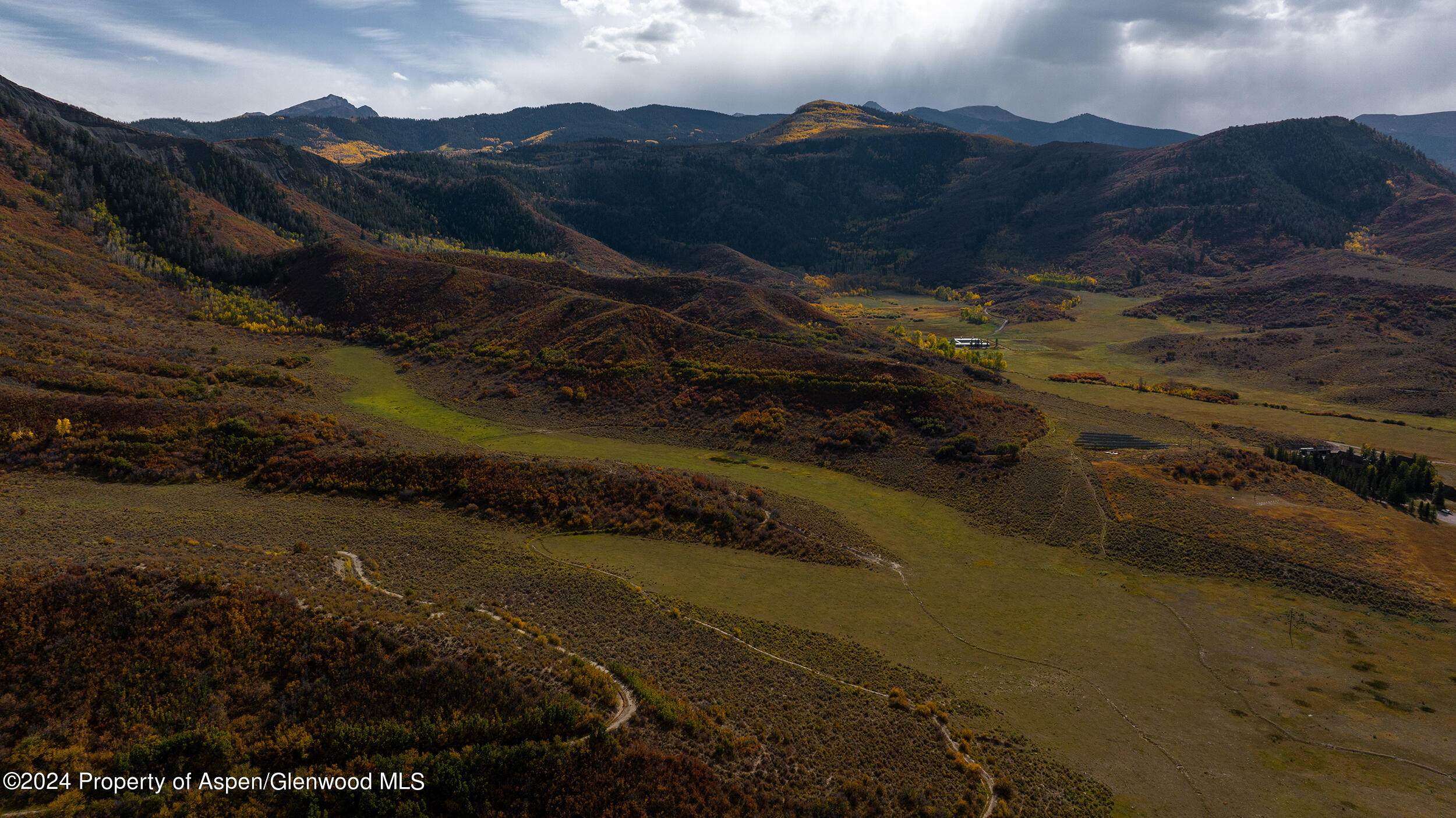 1012 Monastery Road Snowmass, CO 81654 - Photo 13 of 96 a view of a street with a mountain