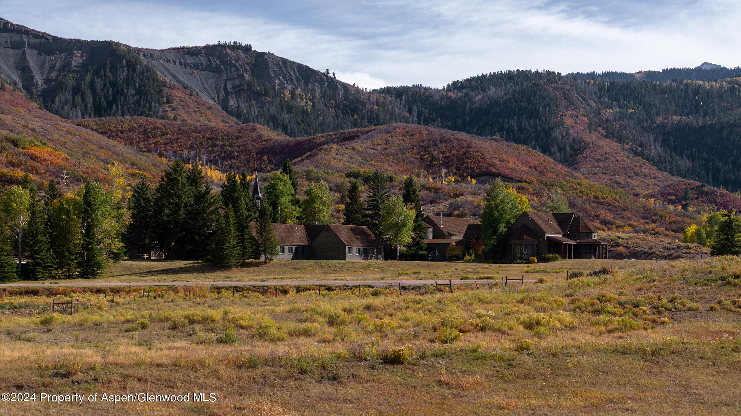 1012 Monastery Road Snowmass, CO 81654 - Photo 21 of 96 a view of a house with a yard