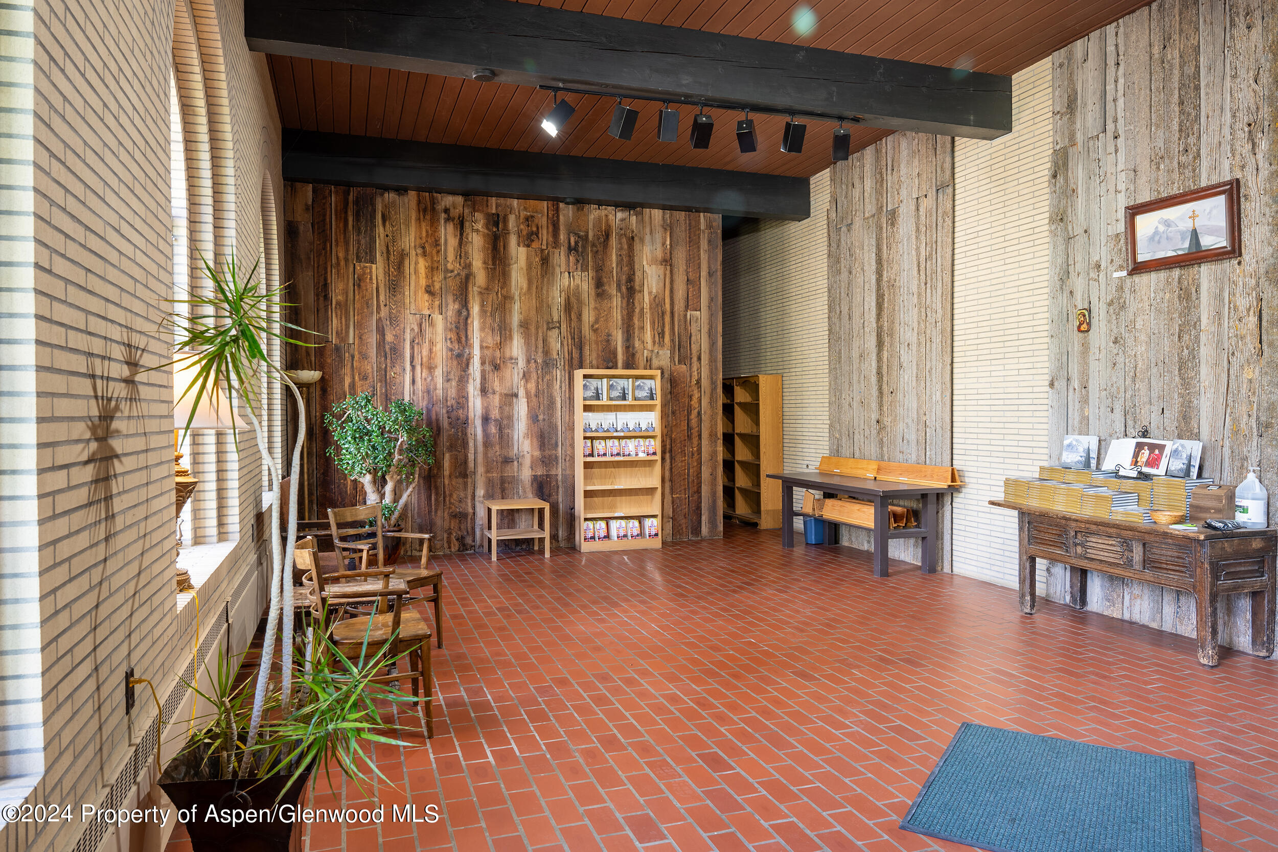 1012 Monastery Road Snowmass, CO 81654 - Photo 25 of 96 a living room with furniture and wooden floor