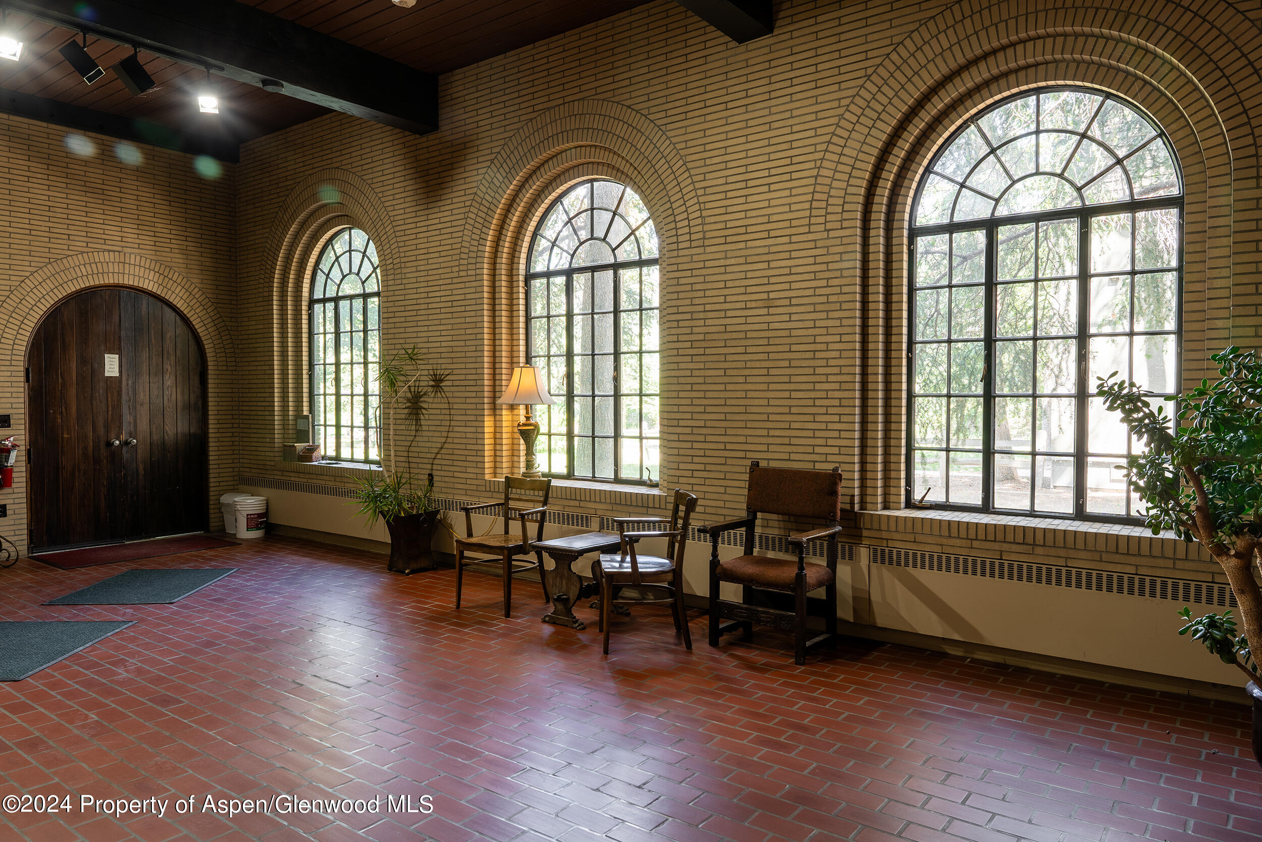 1012 Monastery Road Snowmass, CO 81654 - Photo 26 of 96 a view of livingroom with furniture window and wooden floor