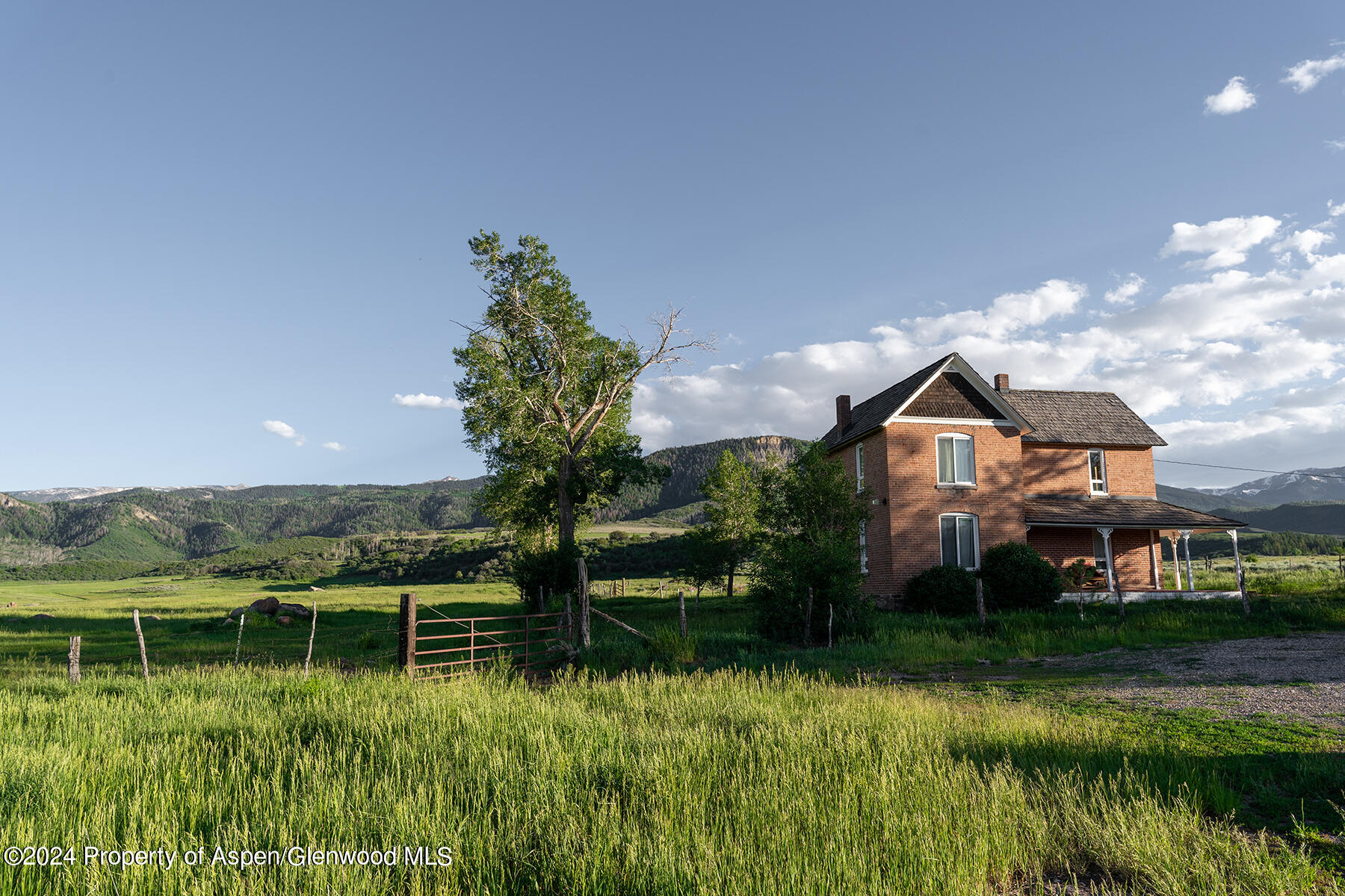 1012 Monastery Road Snowmass, CO 81654 - Photo 75 of 96 a front view of a house with a yard