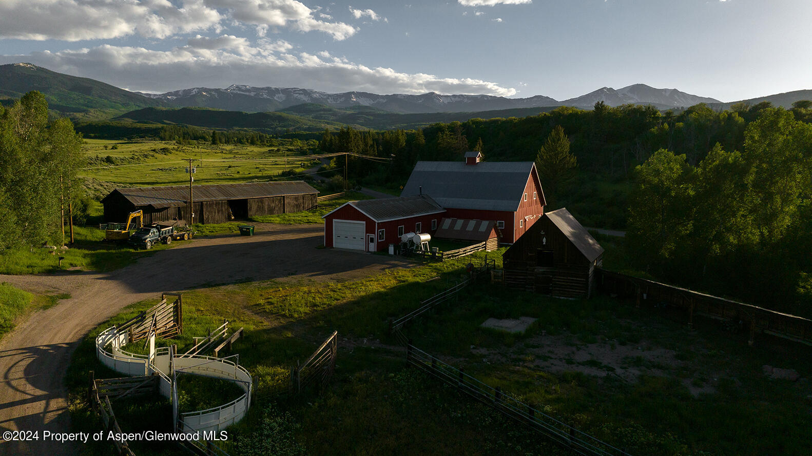 1012 Monastery Road Snowmass, CO 81654 - Photo 76 of 96 a view of a swimming pool with a yard