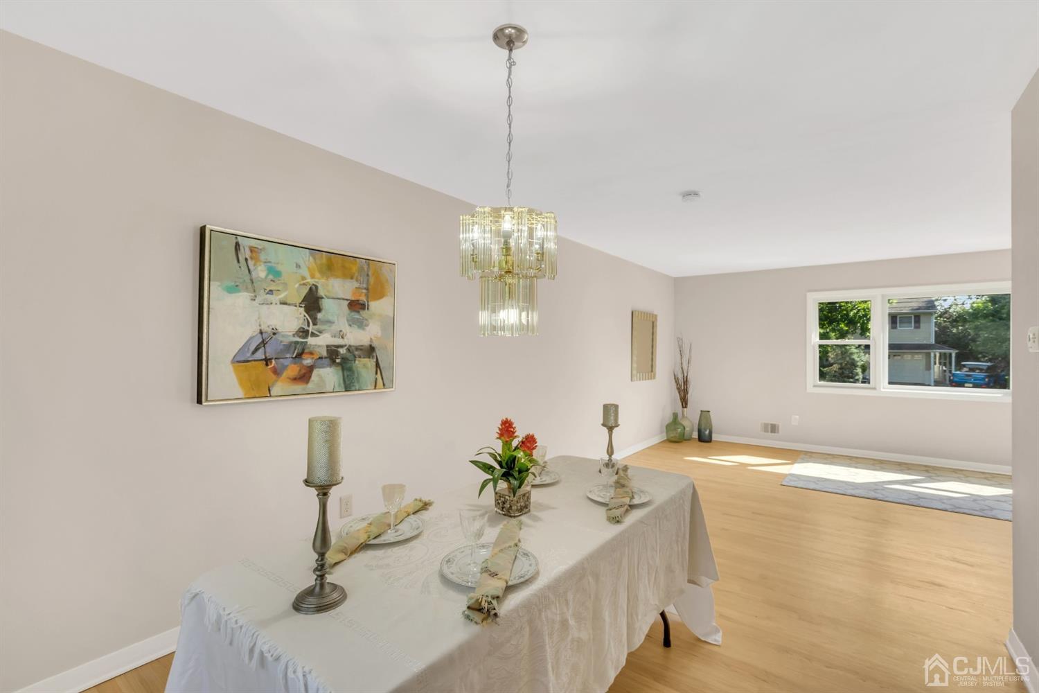 9 Valiant Road East Brunswick, NJ 08816 - Photo 22 of 41 a dining room with furniture and window
