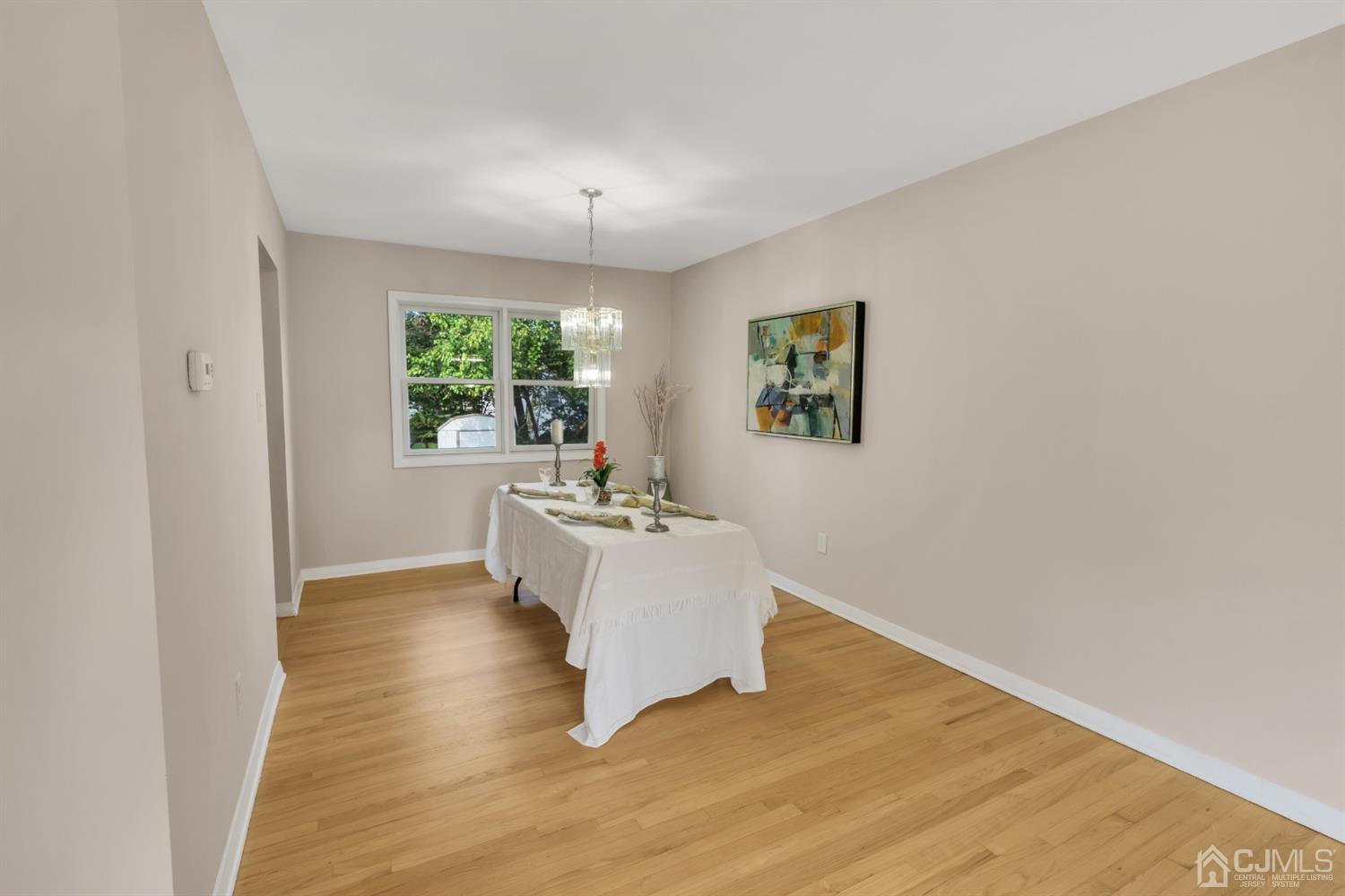 9 Valiant Road East Brunswick, NJ 08816 - Photo 23 of 41 a view of kitchen with wooden floor a sink and a window