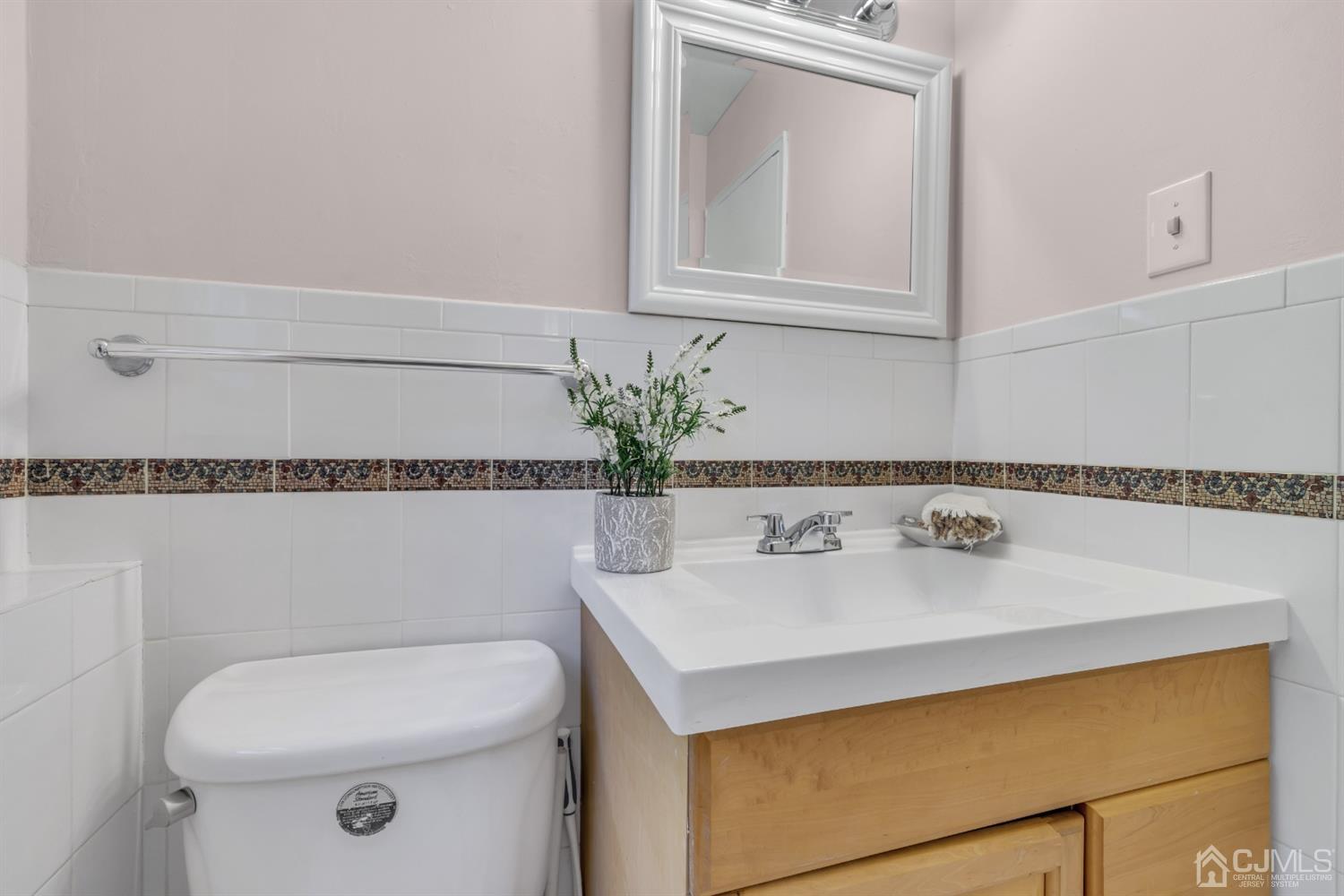 9 Valiant Road East Brunswick, NJ 08816 - Photo 35 of 41 a bathroom with a sink and a toilet