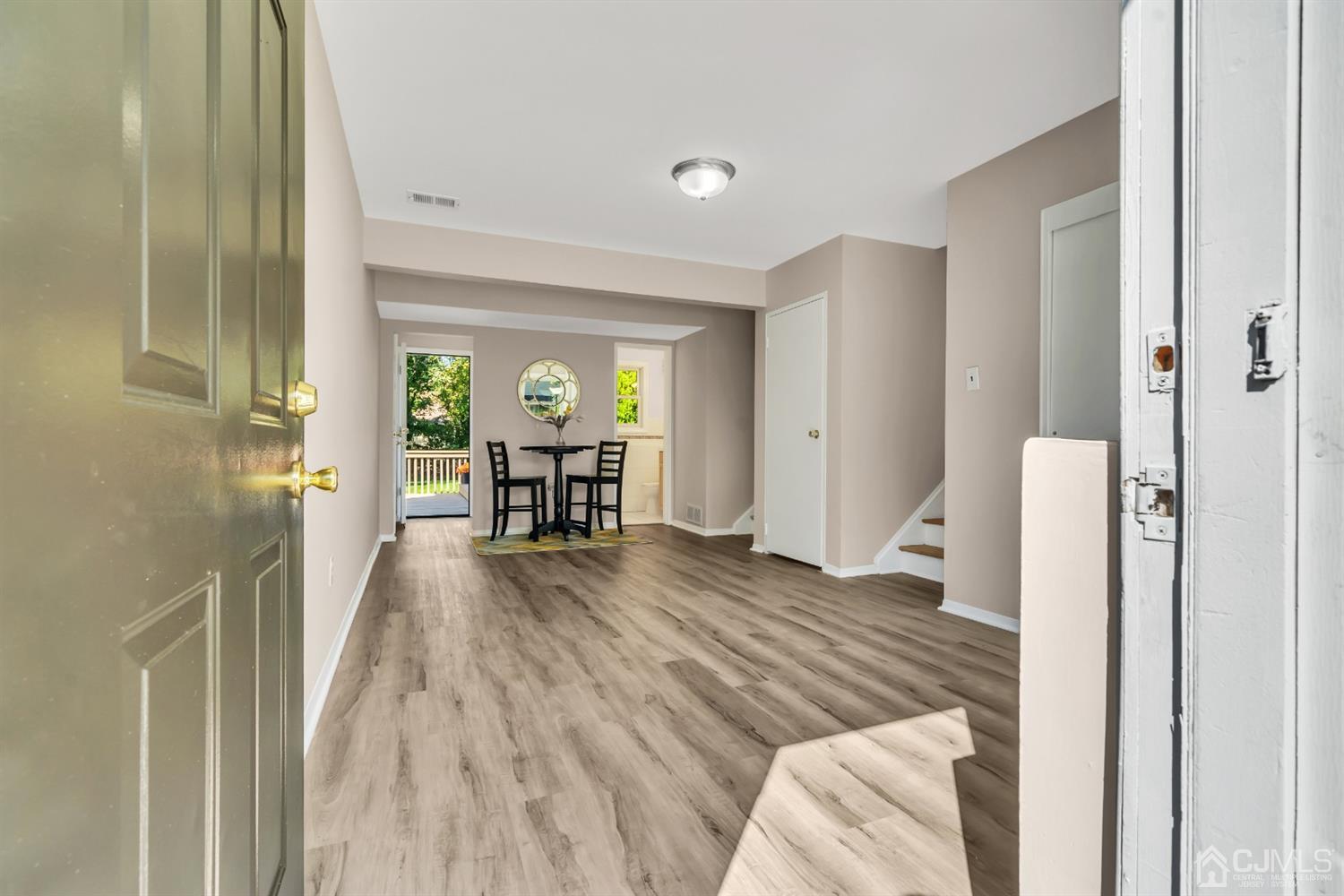 9 Valiant Road East Brunswick, NJ 08816 - Photo 7 of 41 a view of a bedroom with wooden floor and furniture