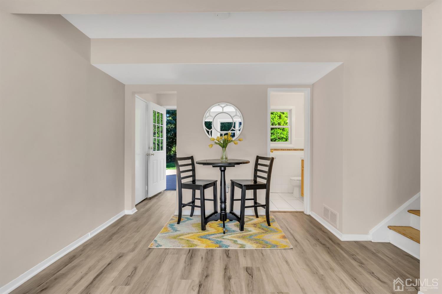 9 Valiant Road East Brunswick, NJ 08816 - Photo 8 of 41 a view of a dining room with furniture and a window
