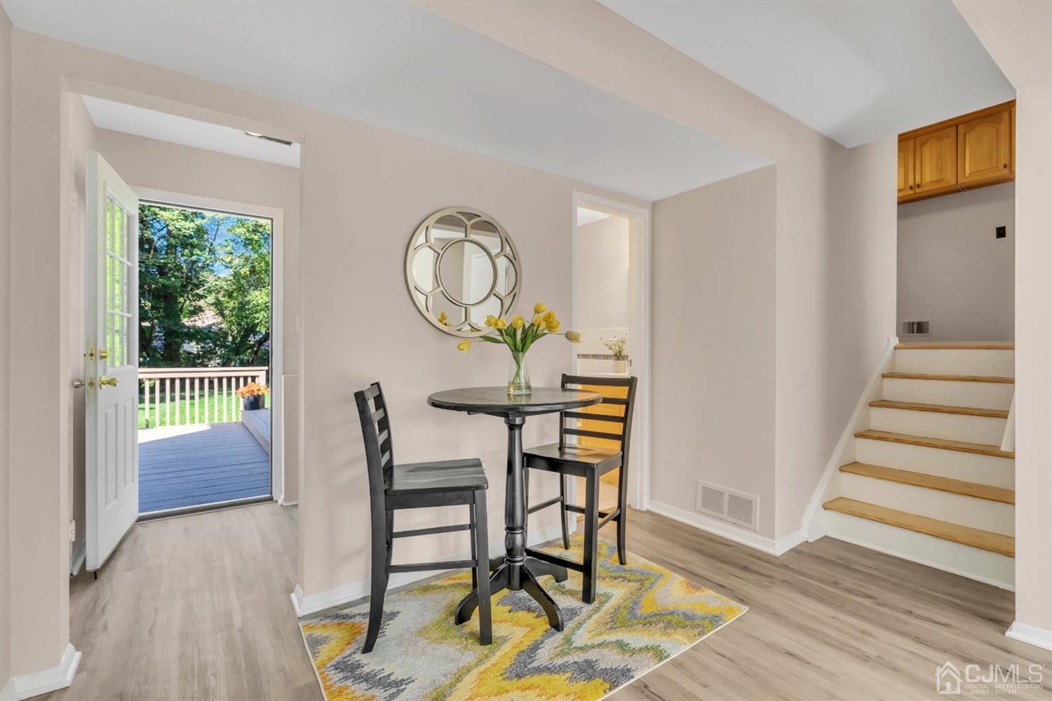 9 Valiant Road East Brunswick, NJ 08816 - Photo 9 of 41 a view of a dining room with furniture and wooden floor