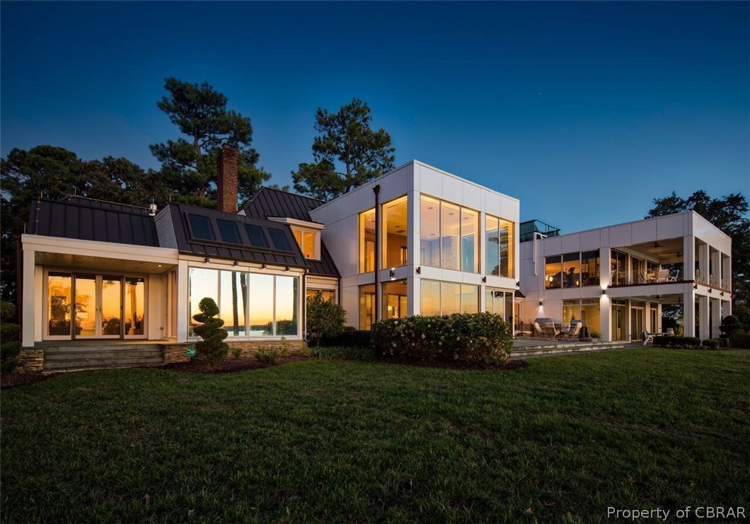 1744 Tyndall Point Road Gloucester Point, VA 23062 - Photo 1 of 47 Full rear view of contemporary exterior of home at twilight.