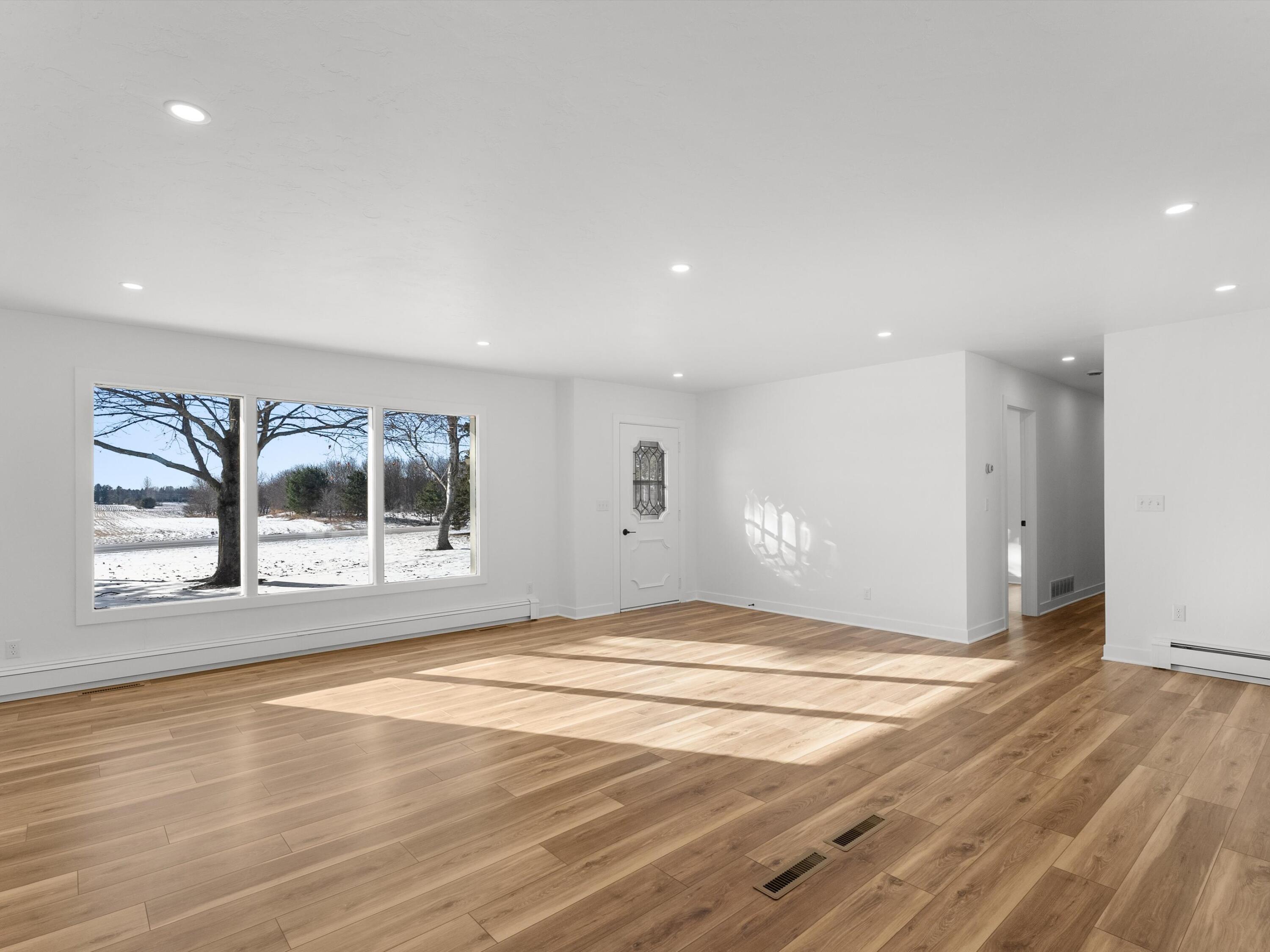 W2276 Ourtown Road Lima, WI 53085 - Photo 9 of 32 Large Window Allows Natural Light In