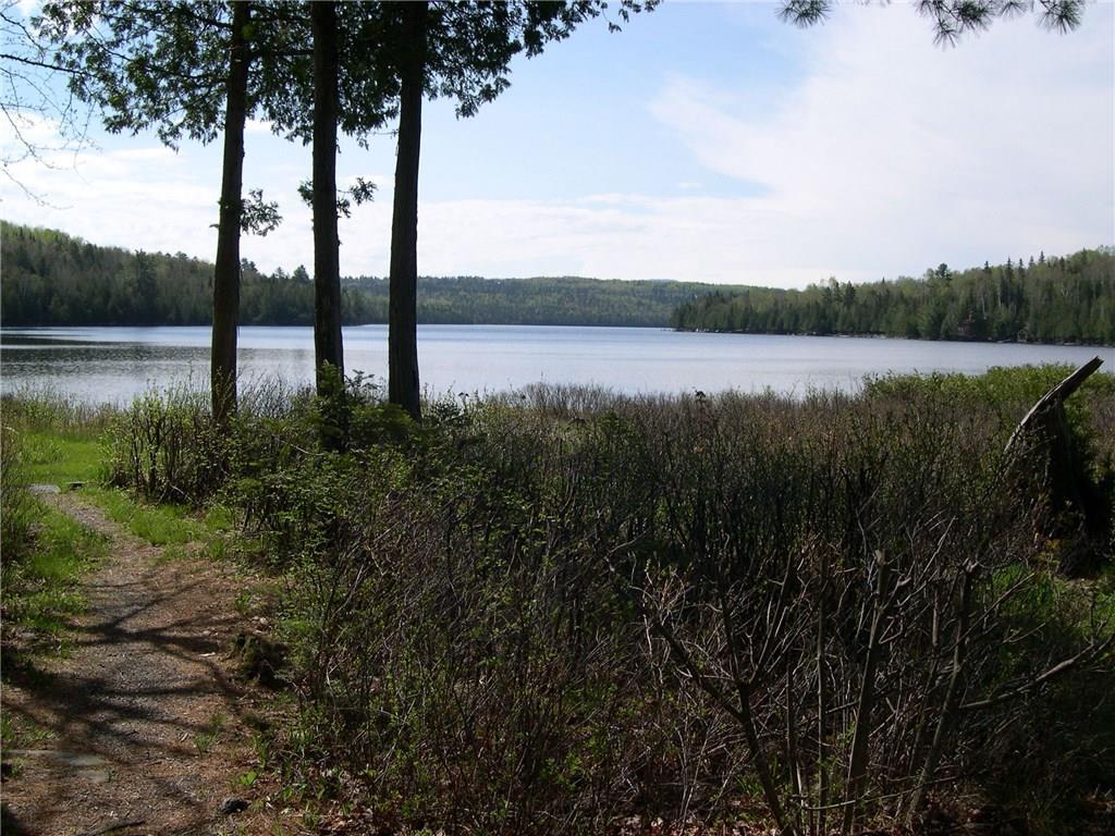 279 Dodge Pond Road, Unit 5 Rangeley, ME 04970 - Photo 20 of 35 path to the shared WF