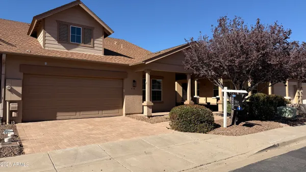 a house view with a outdoor space
