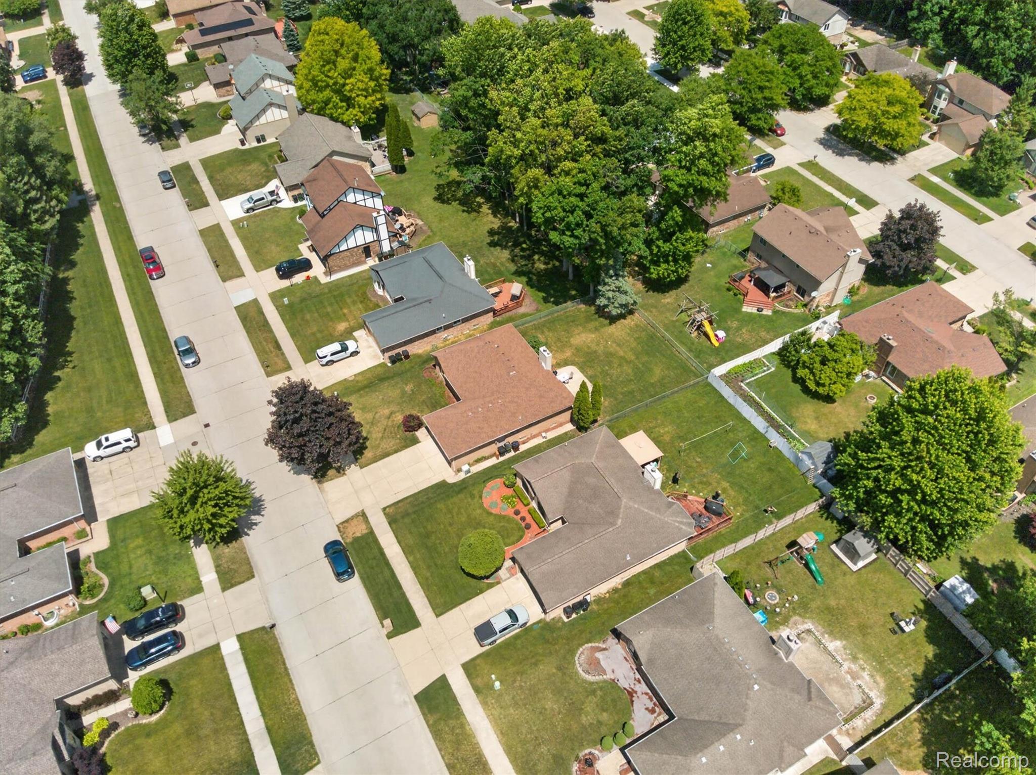 46362 Springhill Drive Utica, MI 48317 - Photo 46 of 59 Residential neighborhood featuring mature trees and manicured lawns