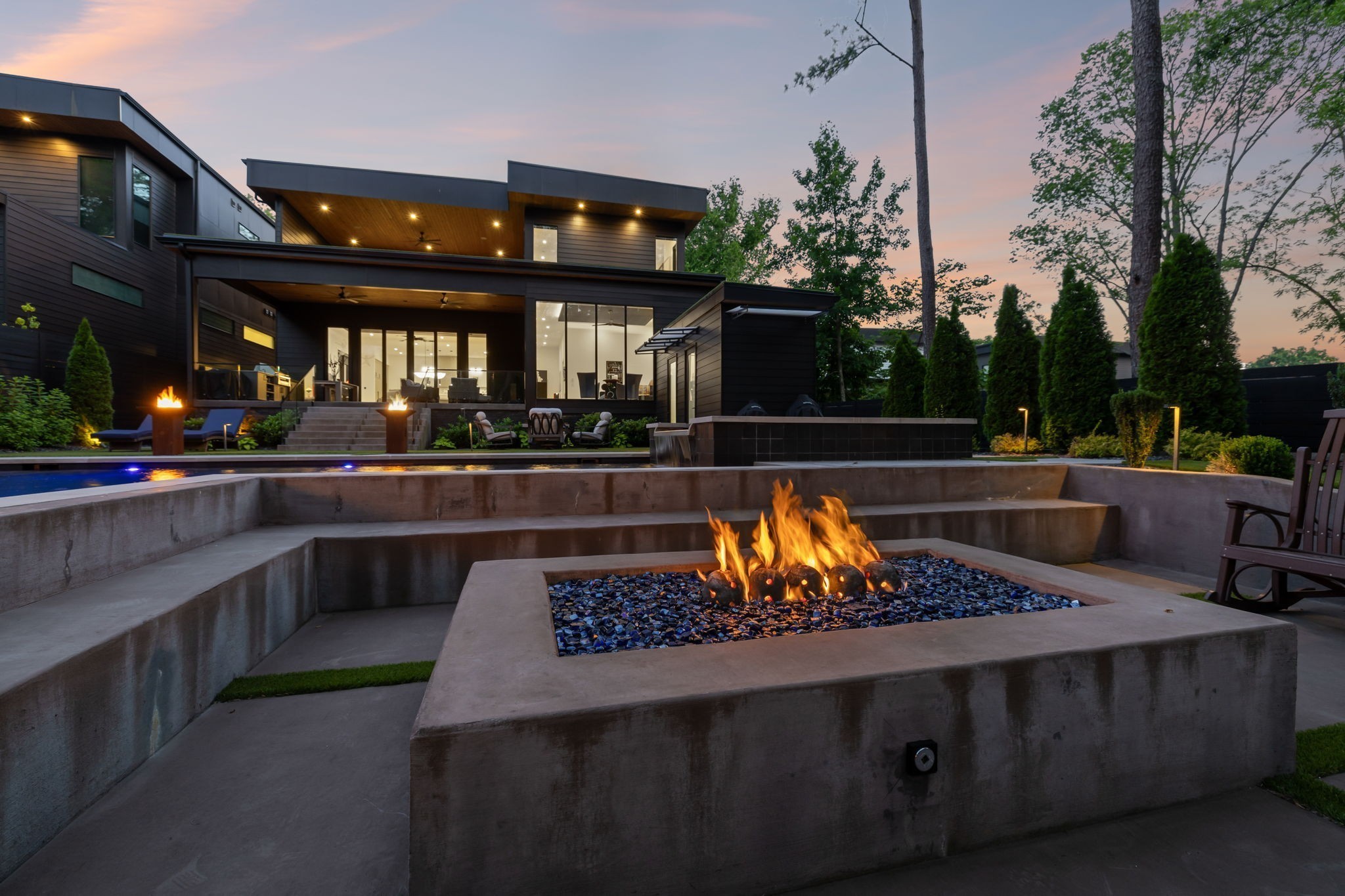 3916 Harding Place Nashville, TN 37215 - Photo 2 of 85 a view of a swimming pool with a patio