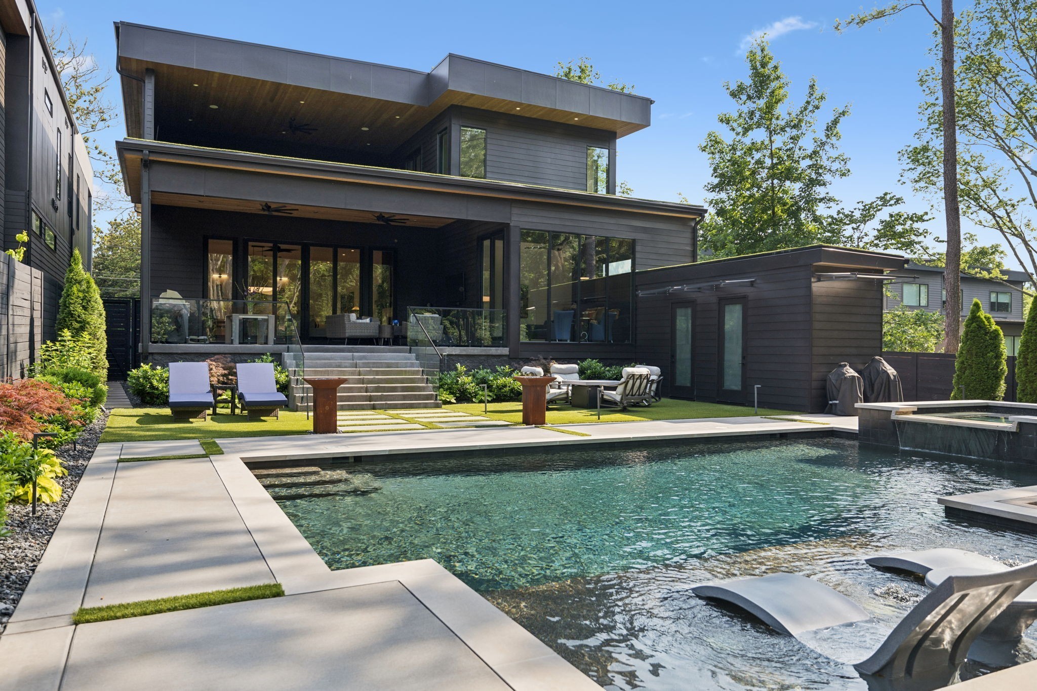 3916 Harding Place Nashville, TN 37215 - Photo 61 of 85 a view of a house with a yard patio and swimming pool
