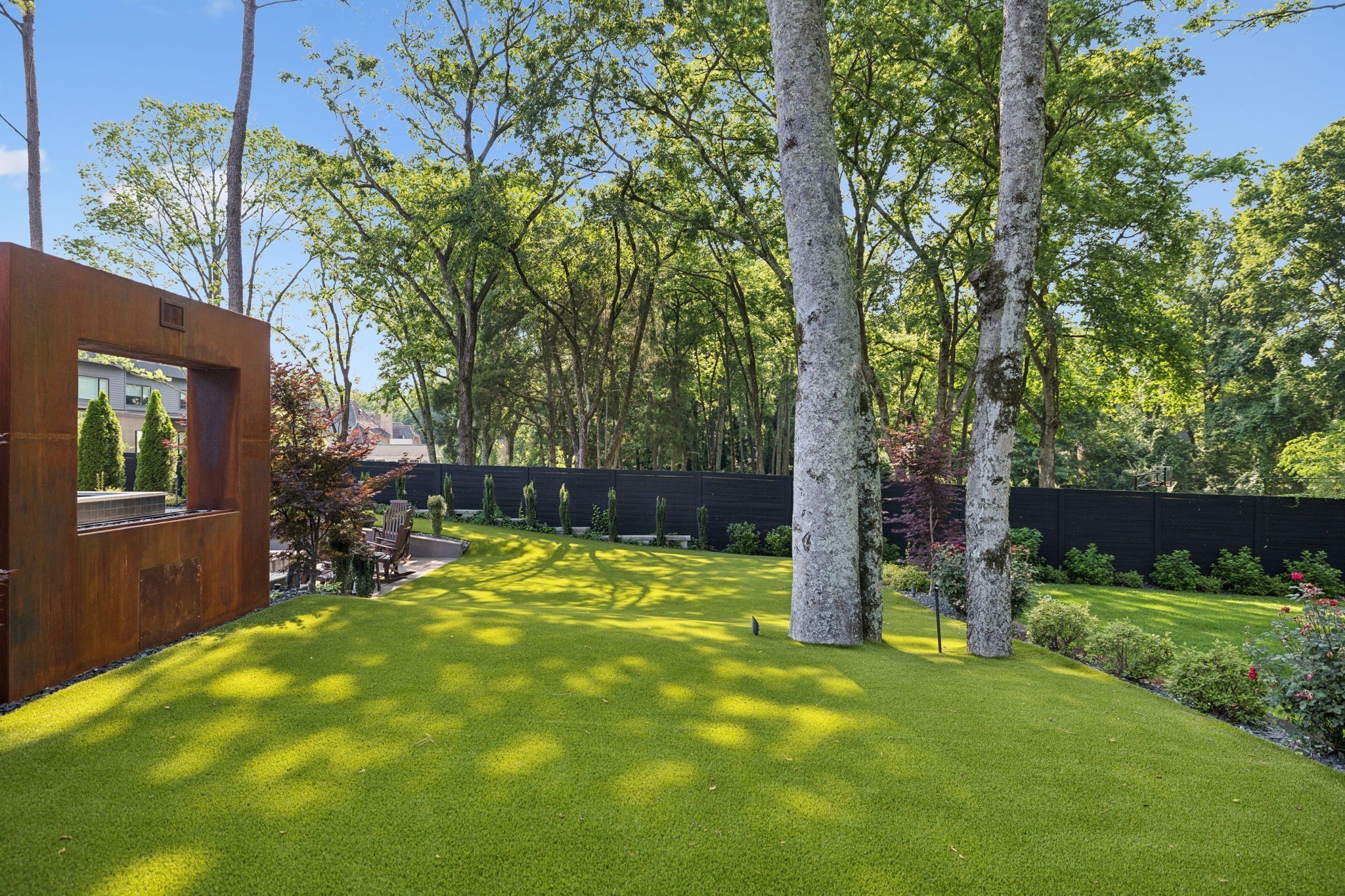 3916 Harding Place Nashville, TN 37215 - Photo 66 of 85 a view of a yard with basketball court