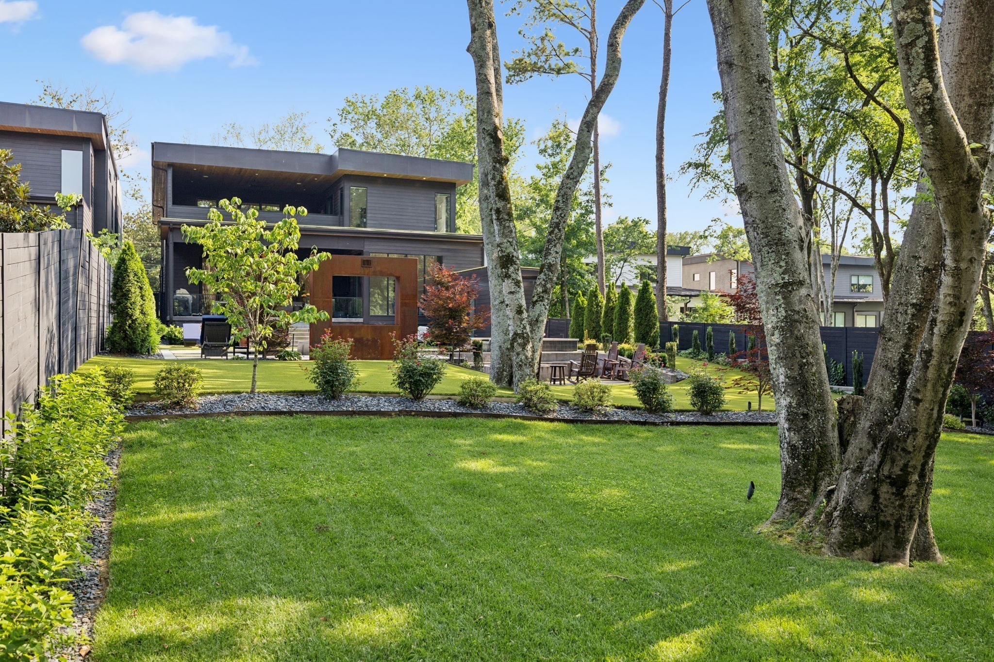 3916 Harding Place Nashville, TN 37215 - Photo 68 of 85 a view of a house with a yard