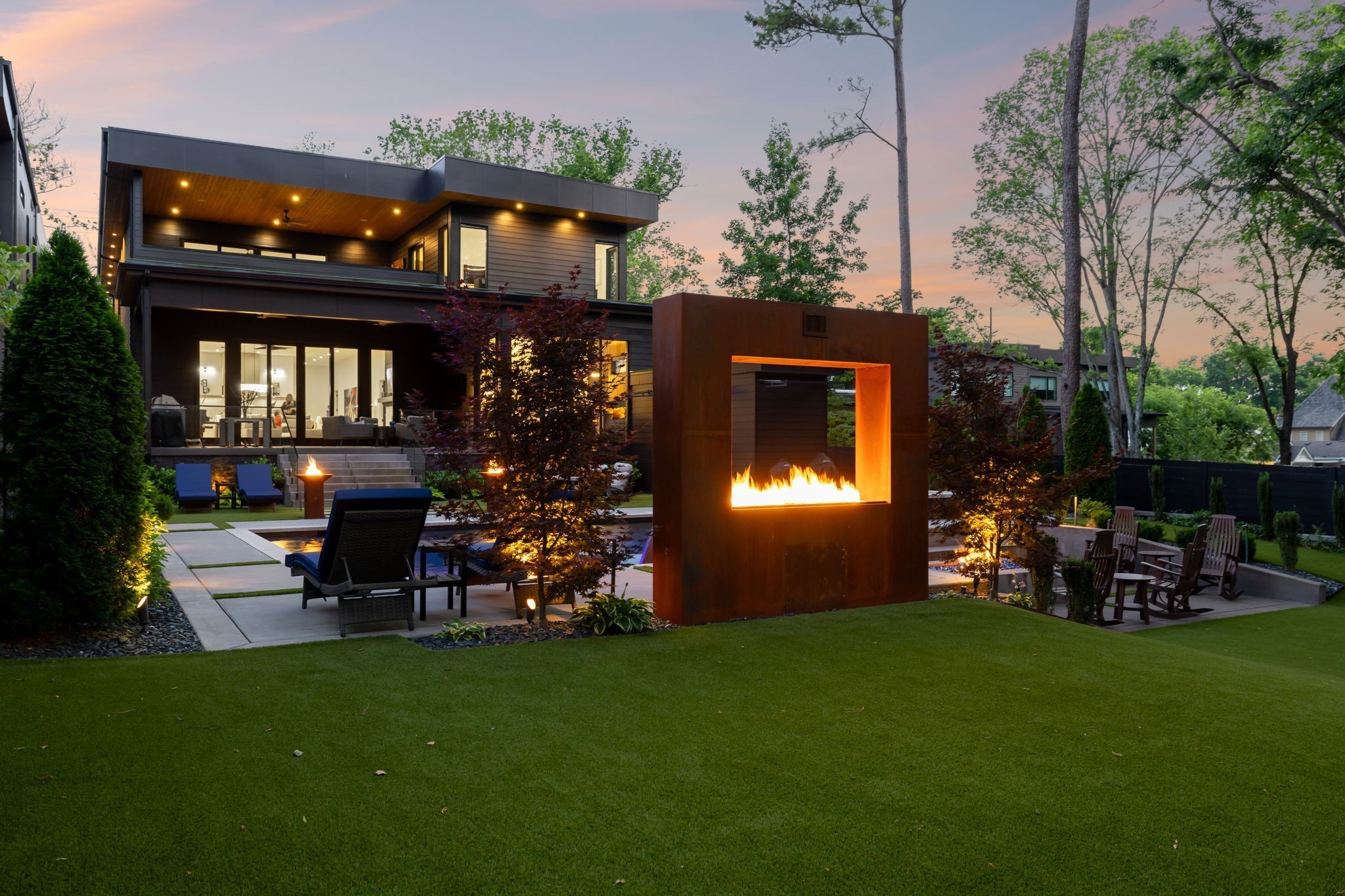 3916 Harding Place Nashville, TN 37215 - Photo 79 of 85 a view of a chair and table in backyard of the house