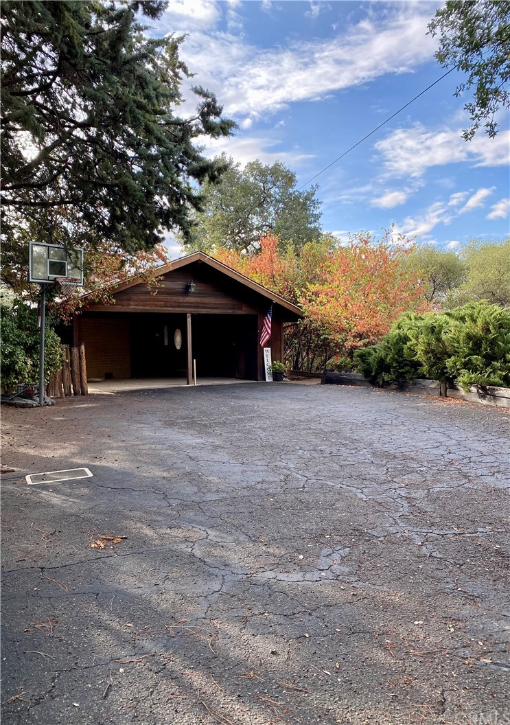 5088 Fairgrounds Road Mariposa, CA 95338 - Photo 1 of 1 Entrance to the home from the driveway to the two car carport and front door!