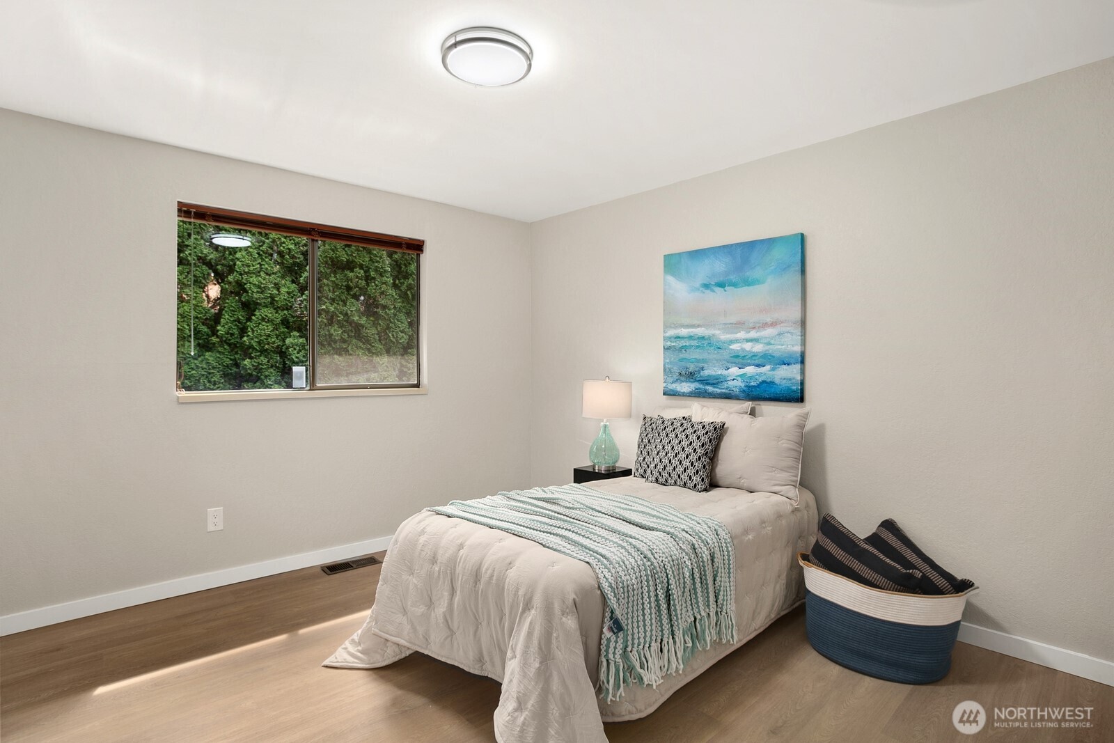 12311 Southeast 96th Place Renton, WA 98056 - Photo 14 of 20 a bedroom with a bed and a window