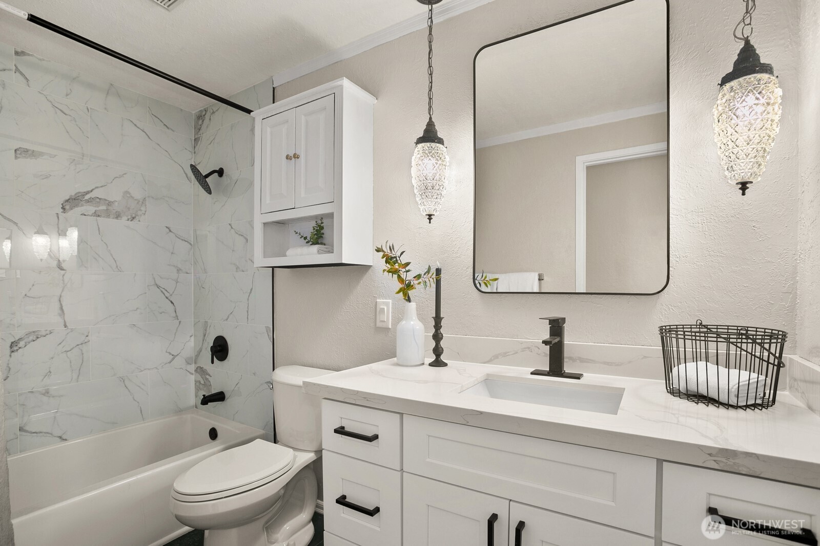 12311 Southeast 96th Place Renton, WA 98056 - Photo 15 of 20 a bathroom with a sink a toilet and shower