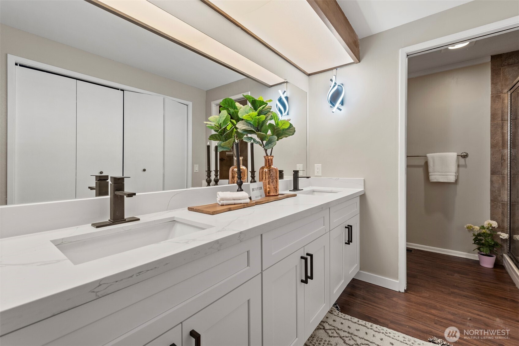 12311 Southeast 96th Place Renton, WA 98056 - Photo 7 of 20 a bathroom with a sink and a mirror