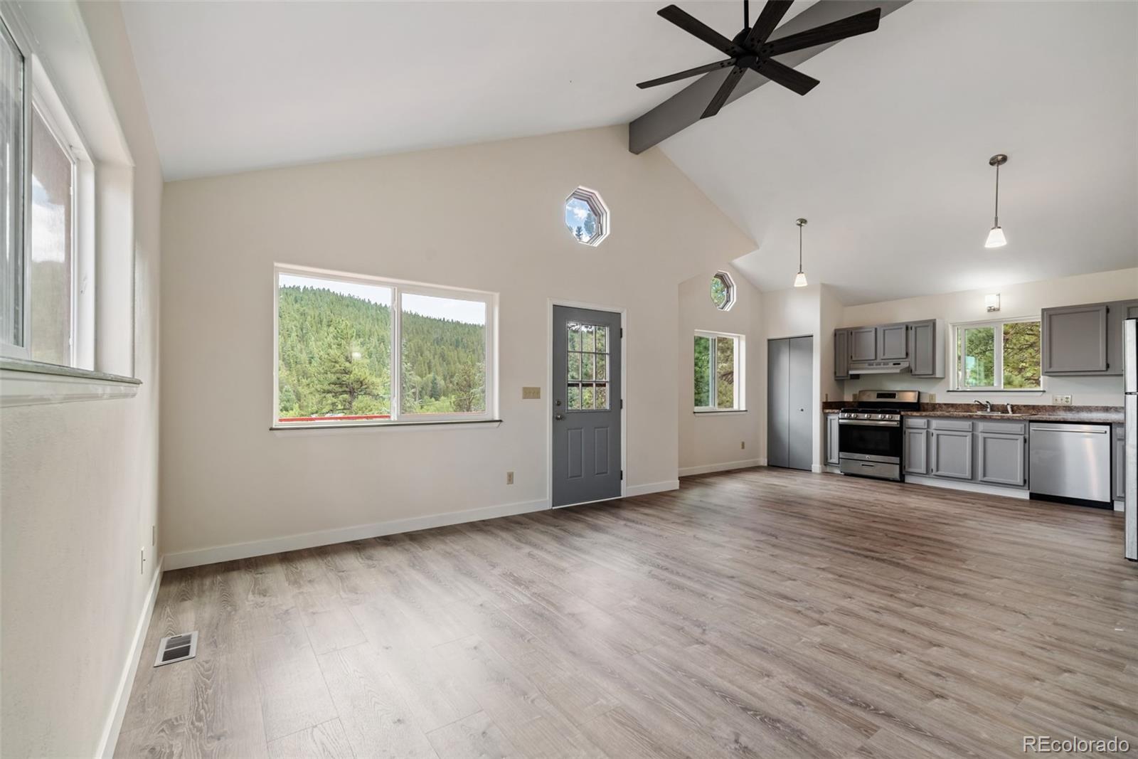241 Schooley Road Bailey, CO 80421 - Photo 15 of 35 a view of a kitchen with a sink and a window