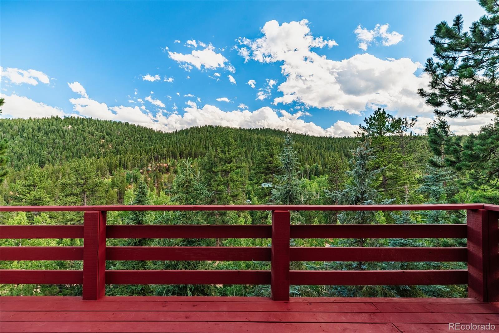 241 Schooley Road Bailey, CO 80421 - Photo 10 of 35 a view of a wooden fence