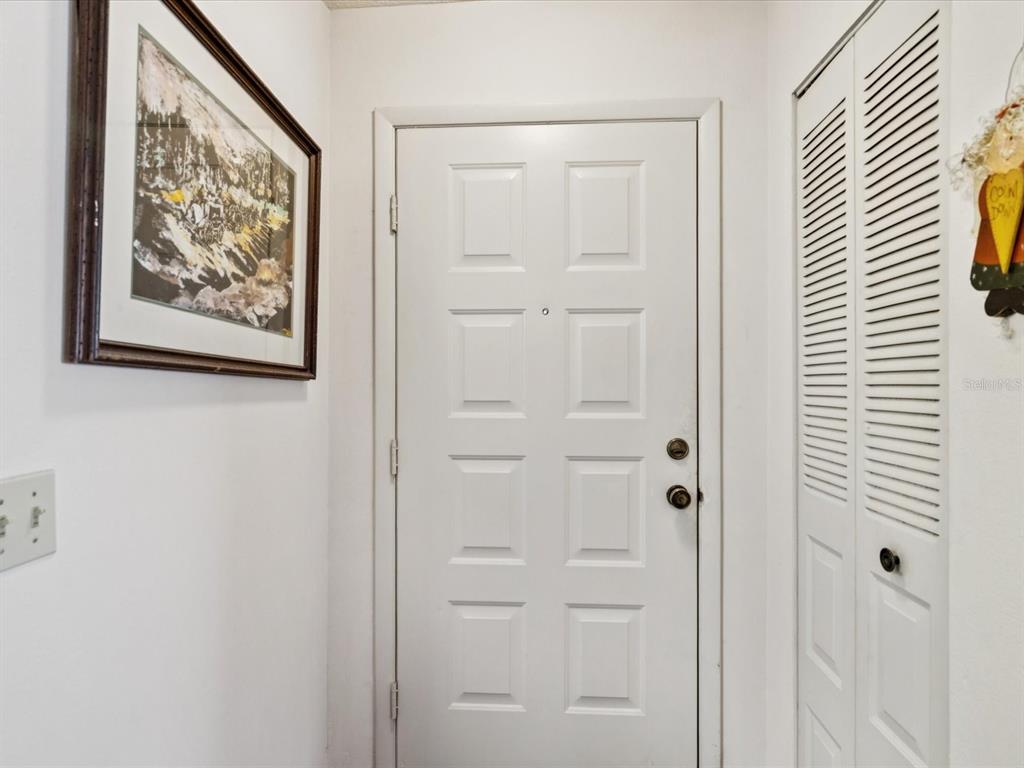 12141 Spartan Way, Unit 202 Hudson, FL 34667 - Photo 12 of 45 a view of a hallway