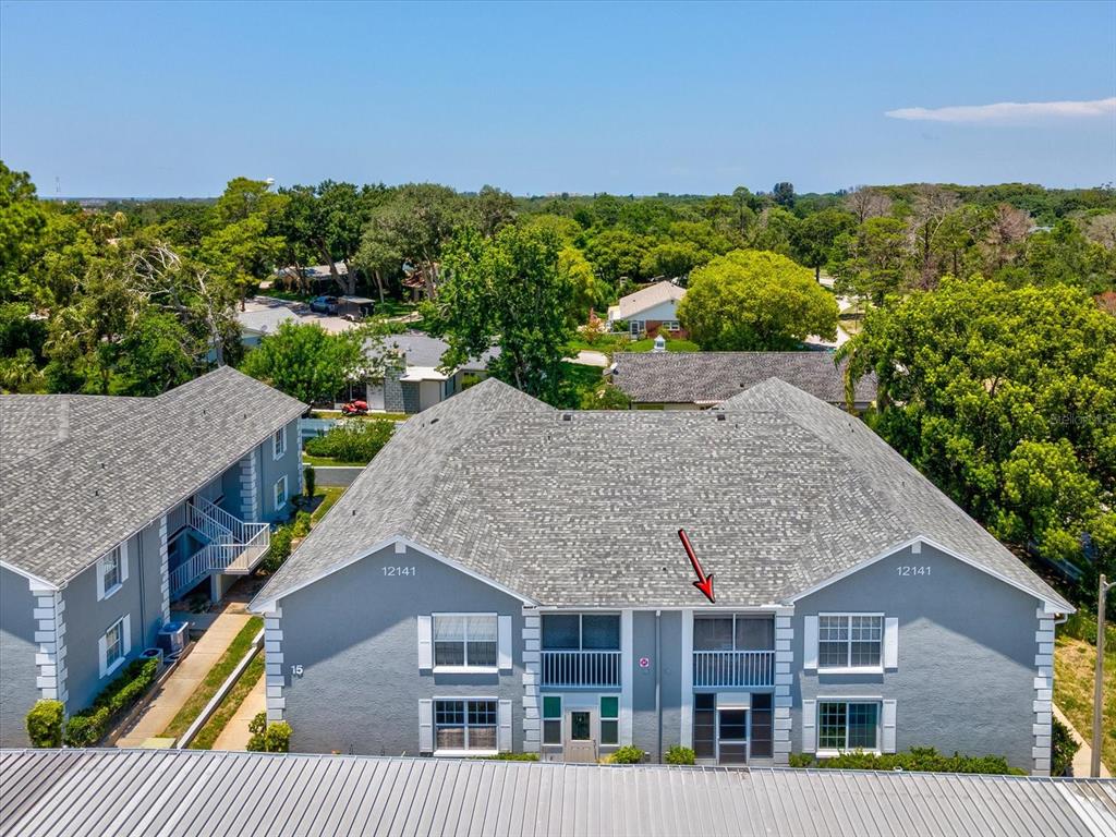 12141 Spartan Way, Unit 202 Hudson, FL 34667 - Photo 31 of 45 an aerial view of a house